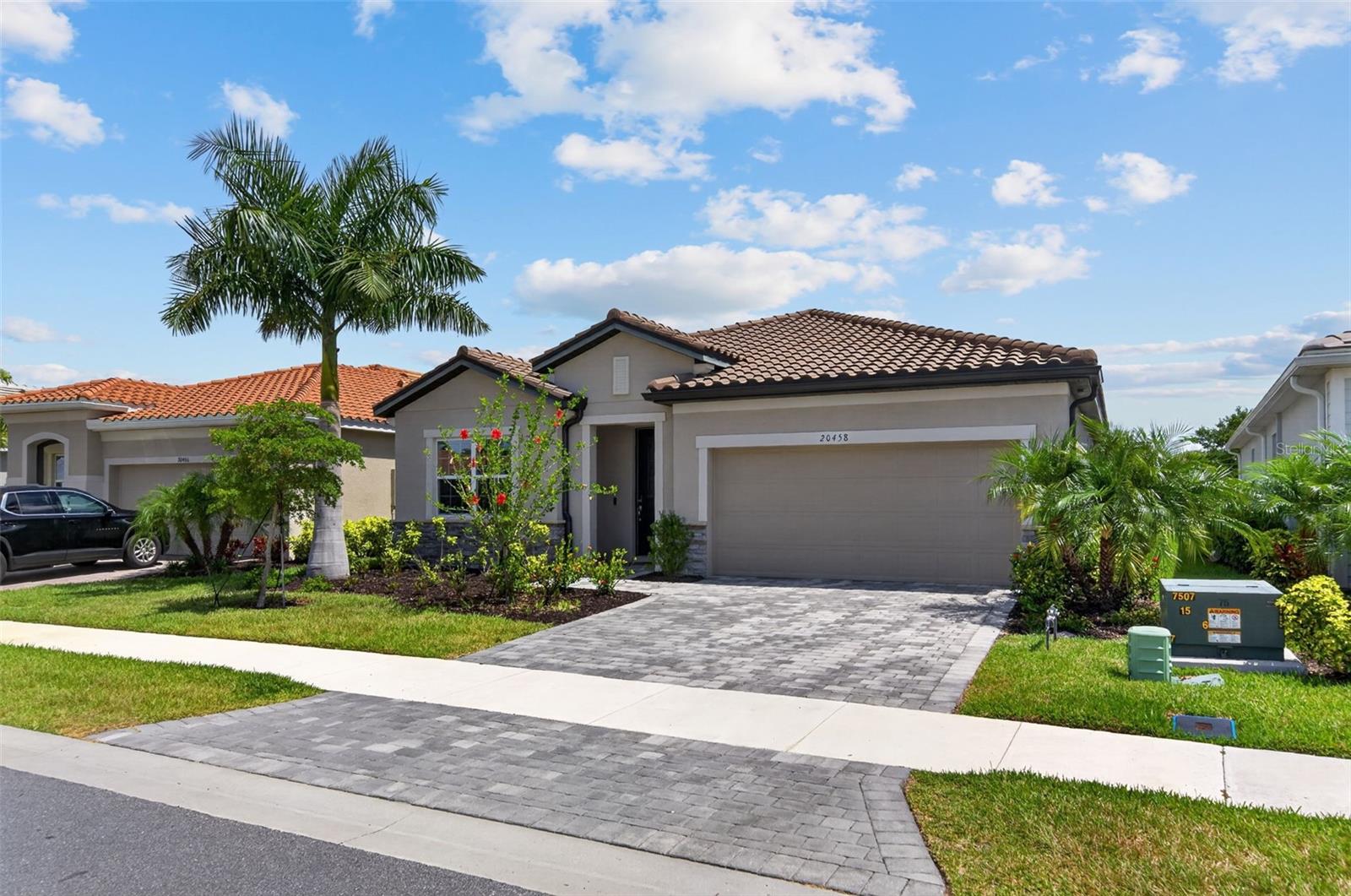 Welcome to this beautifull residence in the highly sought-after community of Wellen Park, offering a perfect blend of modern comfort, elegant finishes, and effortless indoor–outdoor living. Thoughtfully designed and meticulously maintained, this home delivers a bright, open layout ideal for both everyday living and entertaining. Step inside to a spacious great room filled with natural light, enhanced by neutral tones, stylish fixtures, and wide views toward the lanai. The gourmet kitchen serves as the heart of the home, featuring a large center island, quartz countertops, stainless steel appliances, abundant cabinetry, and designer lighting—creating a warm and functional space for cooking, gathering, and hosting. The primary suite provides a serene retreat with ensuite, including dual vanities, a walk-in shower, and a generous walk-in closet. Additional bedrooms are well-appointed and versatile, perfect for guests, a home office, or multigenerational living. A separate flex space offers even more room to personalize to your lifestyle. Sliding glass doors open to the covered lanai, where you’ll enjoy peaceful views of the beautifully landscaped yard. The outdoor area is ideal for relaxing, dining al fresco, or planning future enhancements such as a pool or extended patio. The lot offers privacy and a tranquil backdrop of greenery. Located in vibrant Wellen Park, this home provides access to resort-style amenities, scenic trails, dining, shopping, and the energy of Downtown Wellen. With its modern upgrades, inviting layout, and prime location, this residence offers the best of Florida living—comfort, convenience, and year-round enjoyment.