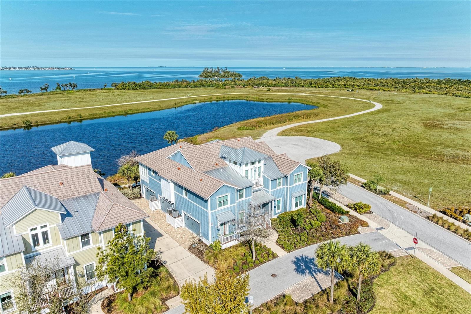 Welcome to your beautiful home with spectacular water views in the luxurious, gated, much
sought after, coastal resort community of Harbour Isle on Anna Maria Sound. This immaculate,
light and bright Andros model home includes three bedrooms, three baths with the Owners’
Retreat and sunroom directly overlooking expansive water views of Sapphire Lake, Anna Maria
Sound and out into Tampa Bay and the Sunshine Skyway Bridge. These beautiful water views
can also be enjoyed from the kitchen and living area. From this luxury home you can relax and
experience unparalleled sunsets everyday. The expansive open living area features the kitchen
(with upgrades galore, stainless steel appliances, newer granite, stone backsplash, gold fixtures
and cabinet pulls and updated cabinets) and large living and dining areas custom made for
entertaining. The tranquil, roomy Owner’s suite features tray ceiling, walk-in closet, room-
darkening drapes, double vanities, linen cabinet, large shower and separate toilet area. The
second guest bedroom has a private en suite bath which allows ultimate privacy for your guests
and the third full bath is located in the hall which makes it accessible to all. Other amenities in
the home are custom window treatments, custom architectural features and paint in living room,
staircase and ceilings, crown molding, upgraded light fixtures and fans, vaulted ceiling, and a
personal home elevator that can be accessed from the oversized two-car garage with upgraded
features and flooring. While inside the gates at Harbour Isle, explore two miles of neighborhood
walking trails and stroll to any of the four nearby neighborhood pools with outdoor grills,
cabanas, fire pit and kayak launch for the 38-acre lake. End the day with an incredible sunset at
the 23,000 square foot Beach Club overlooking Anna Maria Sound. The Beach Club features
resort-style amenities with the Sky Bar, Lounge, Pavilion, Fitness Center, Yoga Lawn, Event
Lawn, resort pool, hot tub and a private beach to launch a kayak in the Sound. Just outside the
gates of Harbour Isle you’ll find the Margaritaville inspired Compass Hotel, Safe Harbor Marina
with wet and dry storage and Floridays waterfront tiki restaurant. Cross the Manatee Bridge and
you’re on Anna Maria Island with its sugar sand beaches and quaint island charm. It’s time to
start living your best life. Live, relax, enjoy an active lifestyle in award-winning Harbour Isle.