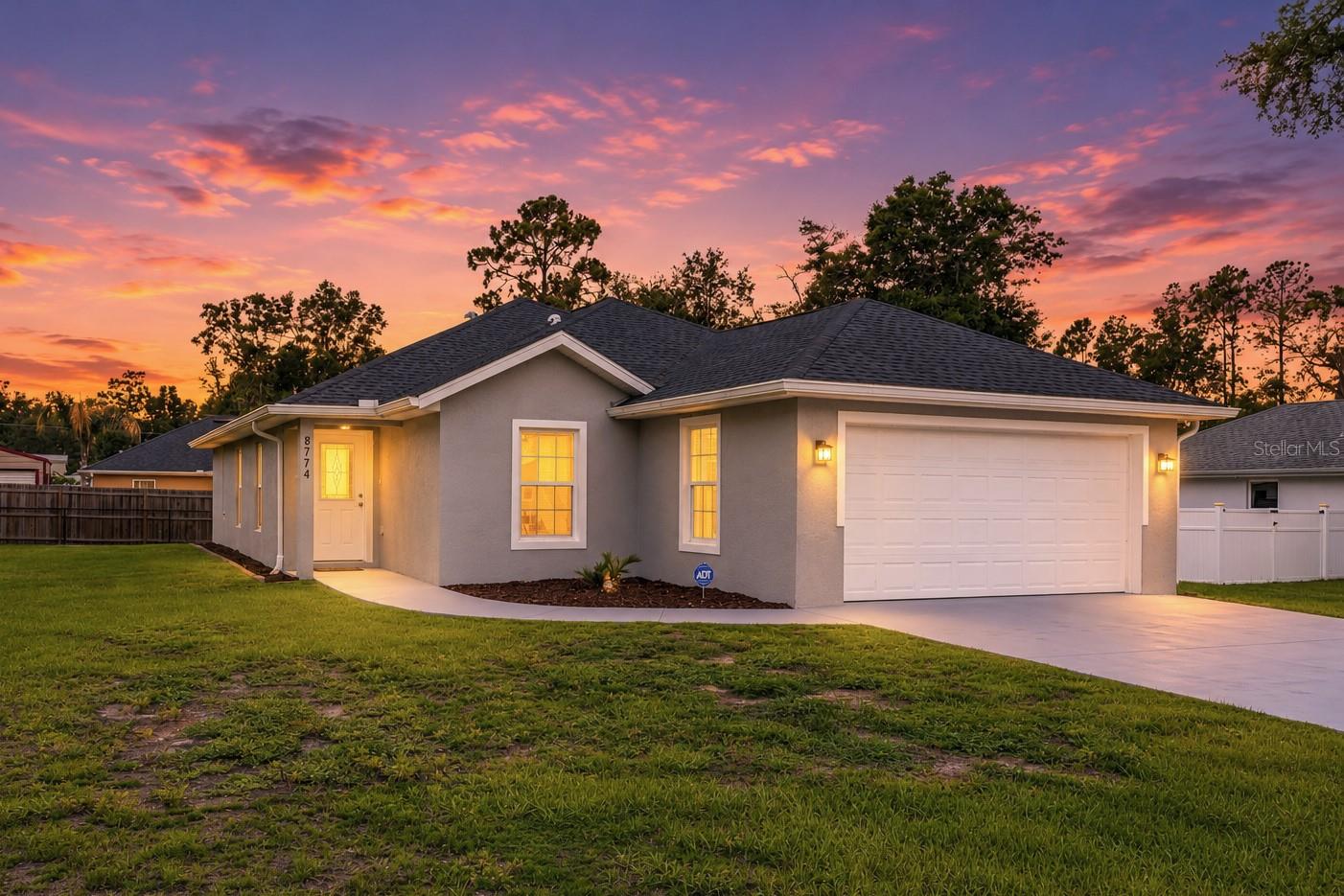 Tucked away in the charming Orange Blossom Hills community of Summerfield, just outside The Villages, this beautifully crafted 2022 home feels like the perfect place to begin your next chapter. Bright, inviting, and practically brand new, this 3-bedroom, 2-bath residence with a dedicated office blends modern comforts with timeless style, creating a space you'll love coming home to.

From the moment you step inside, you'll be welcomed by abundant natural light and gorgeous luxury vinyl plank flooring that flows throughout the home. At the heart of the home, the stunning kitchen is sure to delight, featuring gleaming granite countertops, stainless steel appliances, and a beautiful walk-in pantry that offers both charm and convenience. Whether you're preparing everyday meals or hosting family and friends, this space was designed for gathering and making memories.

Retreat to the spacious primary suite, where you'll find a generous walk-in closet and a spa-inspired ensuite bath complete with a beautifully tiled walk-in shower and sleek tempered glass door, creating a peaceful sanctuary at the end of the day.

Step outside and discover your own private oasis. The backyard offers exceptional privacy and plenty of room to grill, play, garden, or simply unwind beneath the Florida sky. A spacious two-car garage, heat pump system, and well and septic add to the home's practicality and value.

Perfectly positioned just outside The Villages, you'll enjoy easy access to all your shopping, dining, and entertainment needs while still coming home to the tranquility and charm of Orange Blossom Hills. Whether you're searching for your forever home or simply a fresh start, this enchanting property is ready to welcome you with open arms. Come experience the warmth, beauty, and comfort that make this house truly feel like home.