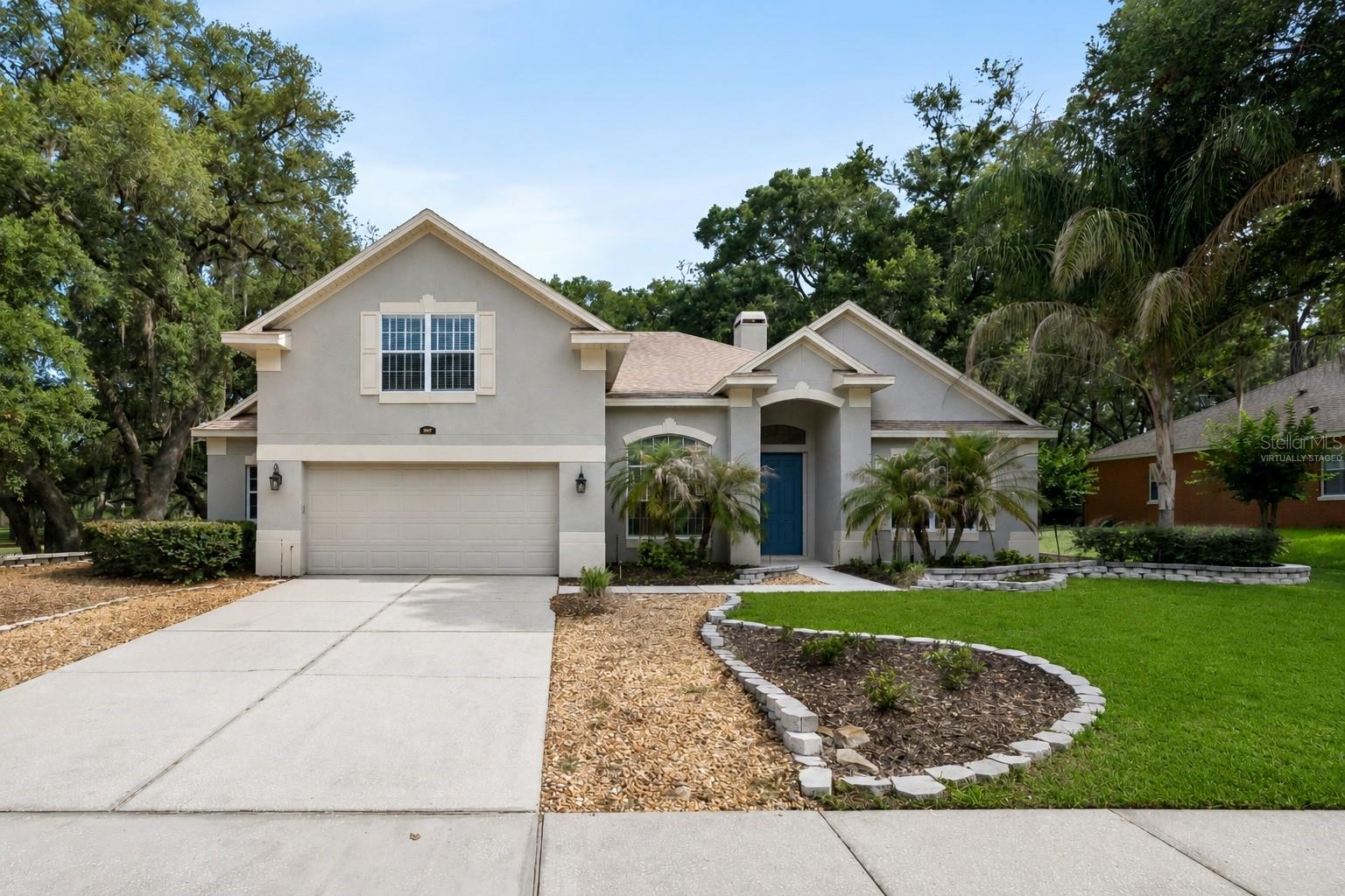 Virtually Staged. Welcome to 597 Sand Wedge Loop in the highly sought-after Rock Springs Ridge community of Apopka! Situated on a rare 0.81-acre corner lot shaded by beautiful mature oak trees, this spacious 4-bedroom, 3-bath home with a versatile loft/flexroom offers over 3,100 square feet of comfortable living space and the perfect blend of privacy, and functionality.
Step inside to discover soaring ceilings, abundant natural light, multiple living and dining areas, and a flexible floor plan designed for both everyday living and entertaining. The spacious kitchen opens to the family room, creating the ideal gathering space for family and friends. Upstairs, provides endless possibilities as a bedroom, media room, home office, playroom, or fitness space.
Major updates have already been completed, giving buyers peace of mind, including a new roof (2017), two high-efficiency HVAC systems (2023), and a new water heater (2023). Additional features include an ADT security system, built-in intercom/radio system, and generous storage throughout.
The oversized backyard offers plenty of room to add a custom pool, outdoor kitchen, playground, or create your own private backyard retreat. With one of the largest homesites in Rock Springs Ridge, opportunities like this are hard to find.
Conveniently located near Kelly Park, Rock Springs Run, Wekiwa Springs State Park, SR-429, shopping, dining, top-rated schools, and major Central Florida attractions, this home provides easy access to everything while maintaining the peaceful feel of an established community.
If you've been searching for a move-in ready Apopka home with acreage, modern updates, a large backyard, and an unbeatable location, 597 Sand Wedge Loop is a must-see.