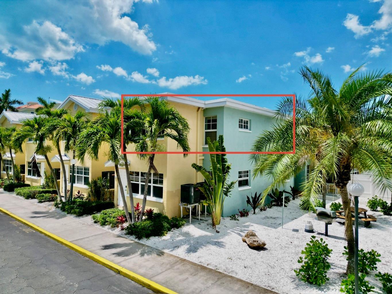 BRIGHT CORNER, UPSTAIRS 1/1 UNIT with laundry room just outside the front door at the Barefoot Beach Resort located on sparkling INDIAN SHORES BEACH!  These units are in Strong Demand and are highly sought after by couples and group travelers, typically seeing some of the highest occupancy rates in the building! The unit comes FULLY FURNISHED with all new Coastal Inspired Furniture and decor in 2025 making it completely TURNKEY. The condo features 1 Bedroom, 1 Bath, an Open floorplan PLUS A BONUS SUNROOM offering INCREDIBLE LIGHT and potential to SLEEP 6. You will appreciate the ceramic tile floors, gleaming white crown molding, white wood cabinetry, closets galore, and a FULLY EQUIPPED KITCHEN with granite counters, coffee maker, full-size appliances and dishwasher.  Barefoot Beach offers everything you could dream and more just steps from your front door. A true WATERFRONT OASIS with LUSH LANDSCAPE featuring HEATED POOL, SUN DECK, community FISHING DOCK, BBQ Grills, outdoor dining areas, bike storage, and PRIVATE BOAT SLIPS which are subject to availability for rent or purchase AND the BEST Part...PRIVATE DEEDED BEACH ACCESS with a signaled cross on demand. NO RENTAL PERIOD RESTRICTIONS. An ideal INVESTMENT PROPERTY, SECOND HOME.  This complex does not require or limit the days an owner can use their unit. For your convenience, there is an on-site property management company should you choose to use them, or you can choose another rental company or rent the unit yourself. Barefoot Beach is located on 5 ACRES along 400 FEET of INTRACOASTAL WATERWAY. This QUAINT BEACH TOWN located on the Gulf of Mexico offers nearby dining, shopping, miniature golf, WHITE SUGAR SAND BEACH and The SUNCOAST BEACH TROLLEY that will take you up and down the Pinellas Beach Coast. Close to John's Pass, Downtown St. Pete with restaurants, night life, museums and famous pier. Two International Airports to serve you both within a 30 minute drive. The unit has future bookings that must be honored by the new owner. All future bookings to move with purchase. YTD through April gross bookings of $17,077.73. Gross bookings of $38,428.78 in 2025. For added peace of mind this unit had ZERO damage from the 2024 hurricanes. Book your showing today!