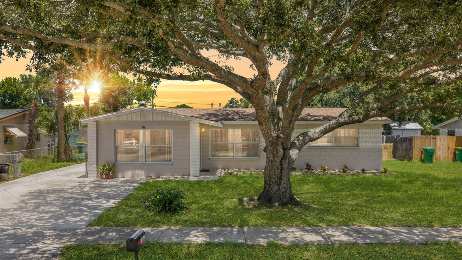 Welcome to 1010 Illinois Road in the heart of Port St. John! This well-maintained concrete block home offers comfortable living space with a functional split-bedroom floor plan designed for everyday living. Recent updates include a new roof (2022) and freshly painted interior and exterior, providing peace of mind for the next owner. Inside, you'll find an inviting living room, an eat-in kitchen, a spacious Florida room that's perfect for a home office, playroom, or additional living space, plus an indoor laundry room for added convenience. Step outside to enjoy the large, fully fenced backyard, complete with a covered patio and a storage shed/workshop. A wide, gated side driveway provides ample room for boat or RV parking, making this property ideal for outdoor enthusiasts. With no HOA, you'll have the freedom to store your recreational vehicles with ease. Conveniently located near shopping, dining, schools, parks, and major roadways, this home offers an easy commute to Kennedy Space Center, Port Canaveral, and the beaches, while still enjoying the quiet charm of an established neighborhood.