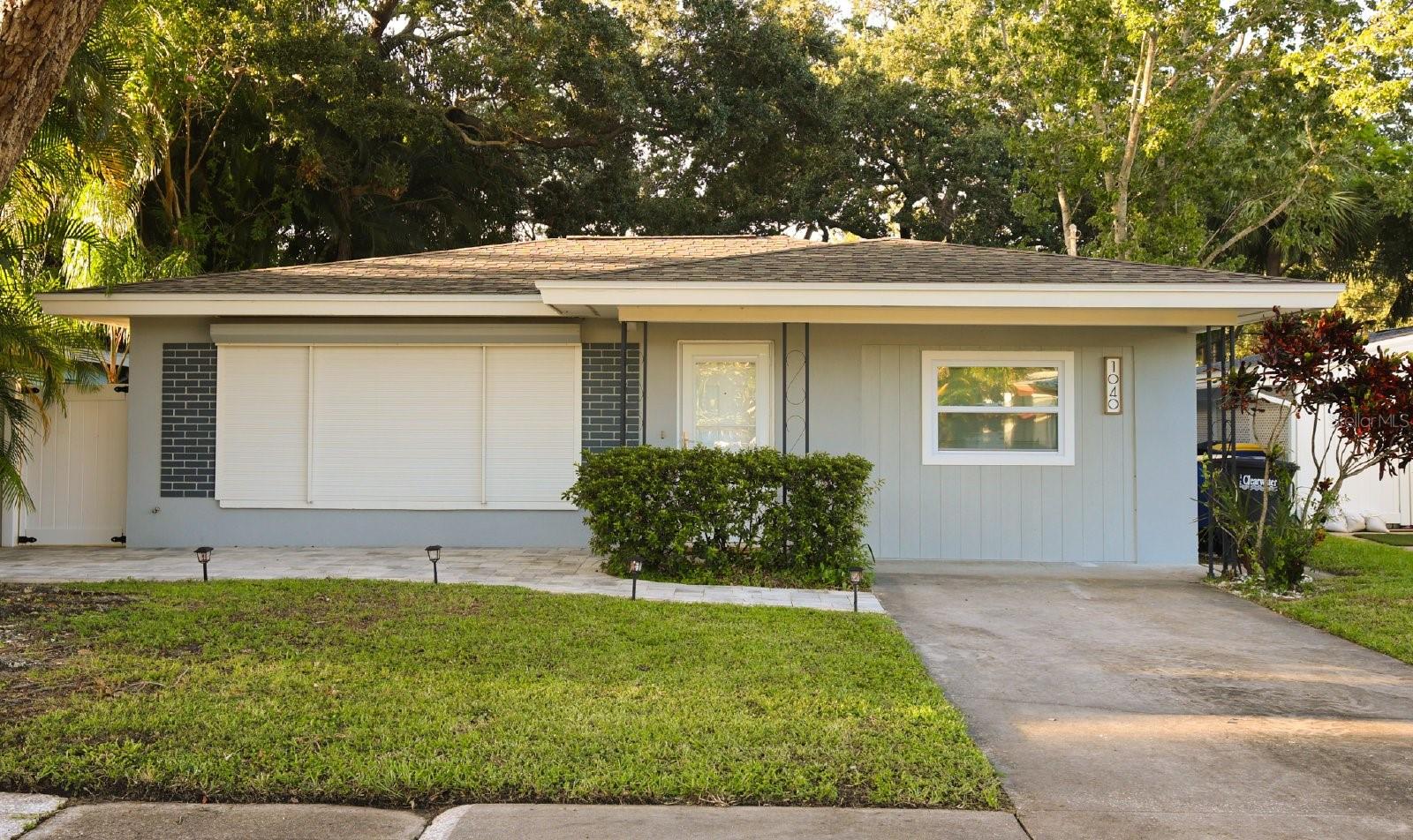 This charming single-family home features 3 bedrooms and 2 beautifully renovated bathrooms, along with a modern kitchen that’s ready for your culinary adventures. The open-concept living space boasts elegant terrazzo flooring, Spacious bedrooms and living rooms, enhancing the home's fresh and airy feel. Step outside to your very own private retreat, where gentle Gulf breezes and the serene backyard oasis create a secluded peaceful environment. The property includes a handy storage shed and offers a lifestyle of outdoor enjoyment with walking, biking, kayaking, boating, and fishing just steps away. Explore an epicurean adventure with the Downtown nightlife of Dunedin and feel free to indulge to your delight, because its a short walk, ride, or gulf cart to dinner. Bring your pets and Enjoy liberating walks along the scenic intercoastal waterway along Edgewater Dr. only a few steps away from your front door. Easy access to Pinellas Trail or Edgewater Park, leading you to a vibrant selection of restaurants, shopping, breweries, parks, and festivals in nearby Dunedin. Plus, you're just a short drive from Honeymoon Island, Caladesi Island State Parks, the iconic Clearwater Beach, and only 30 minutes from Tampa International Airport, connecting you to Tampa Bay’s top entertainment, sports, arts, and cruise options. Be the FIRST to see and secure this home.