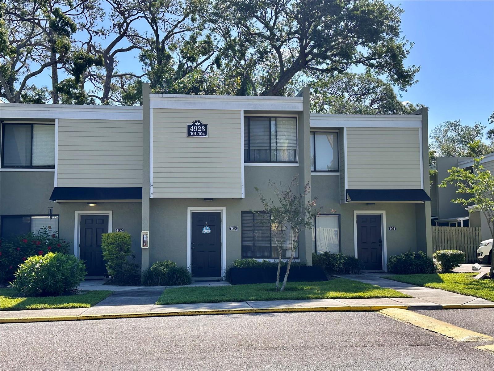 Welcome to Grand Oaks — Stylish Townhouse Living in super W BRADENTON location!
Don’t miss this beautifully updated 2-bedroom, 1.5-bath townhouse-style condo in the desirable gated community of Grand Oaks — offering an easy, coastal lifestyle just minutes from the Gulf beaches.

This light-filled home features a spacious, open floor plan with multiple spaces to gather and entertain. The updated kitchen offers classic white shaker-style cabinetry, Whirlpool stainless steel appliances, and a convenient pass-through to the dining area — perfect for serving meals or hosting guests. On the opposite side, a breakfast bar opens directly to the living room, providing additional seating and creating a wonderful connection between the kitchen and main living space.

A screened and enclosed porch extends your living area and leads to a private, fenced courtyard — perfect for relaxing and enjoying the Florida sunshine.

Upstairs are two spacious bedrooms with generous closets and an updated bath featuring a beautifully tiled walk-in shower. This end unit townhome is diagonally across from the fitness center & the heated pool! Your designated parking spot is just outside your door for ease.

This property can also be purchased fully furnished, turn-key — if negotiated — with stylish, recently purchased furnishings that show beautifully!

Grand Oaks offers resort-style amenities including a heated community pool, fitness center, dog park, and even a designated car care area. The gated entrance is enhanced with a surveillance camera for added peace of mind.

Two small pets are permitted, and with 3-month minimum rentals allowed, this property is ideal as a full-time residence, seasonal getaway, or smart investment opportunity.

Located close to State College of Florida, IMG Academy, and vibrant downtown Bradenton, SRQ airport, shops, dining, and just a short drive to the world-famous beaches of Anna Maria Island. CALL TODAY TO SCHEDULE YOUR PRIVATE VIDEO OR IN-PERSON TOUR.