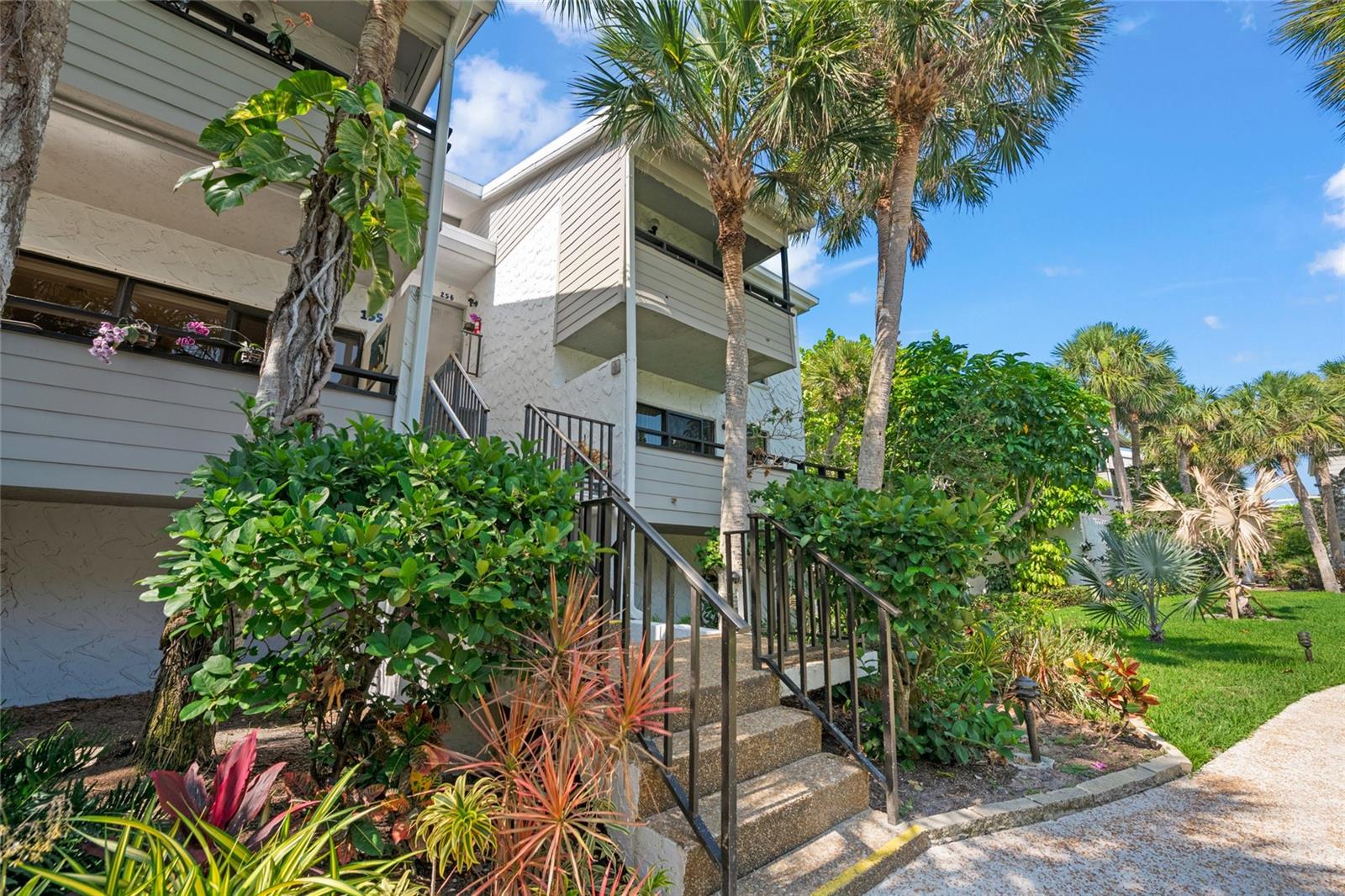 ! Seller has taken a substantial PRICE REDUCTION! Welcome home to Bahia Vista Gulf, a lush, green, garden complex on the Gulf. BVG is a mid-rise complex that has had new roofs done as well as a new look to the pool, decks and lanai. This condominium is being offered turnkey, with newer flooring through the living area, making for a nice first impression. The carpeting is also being replaced in the primary bedroom. This unit has been a family winter getaway for many years. There is potential for rental income in the 2026 season. BVG is a great rental complex since there is a one-month minimum rental policy. The complex has walkways leading to the new and improved pool with a variety of relaxing areas to enjoy the friendly people at Bahia Vista Gulf. This unit has two bedrooms and two baths and is very well kept clean and comfortable. Since this is an end unit, you will appreciate the extra windows and sunshine streaming in the great room and kitchen. Balconies front and back, perfect for enjoying a beautiful Florida sunset. The city on the Gulf has so much to offer, including restaurants, shopping, theaters, parades, festivals, a farmers market every Saturday, an art center, state-of-the-art library and so much more. Beaches galore and sunsets are free here in Venice, as well as the parking. Come and see for yourself!