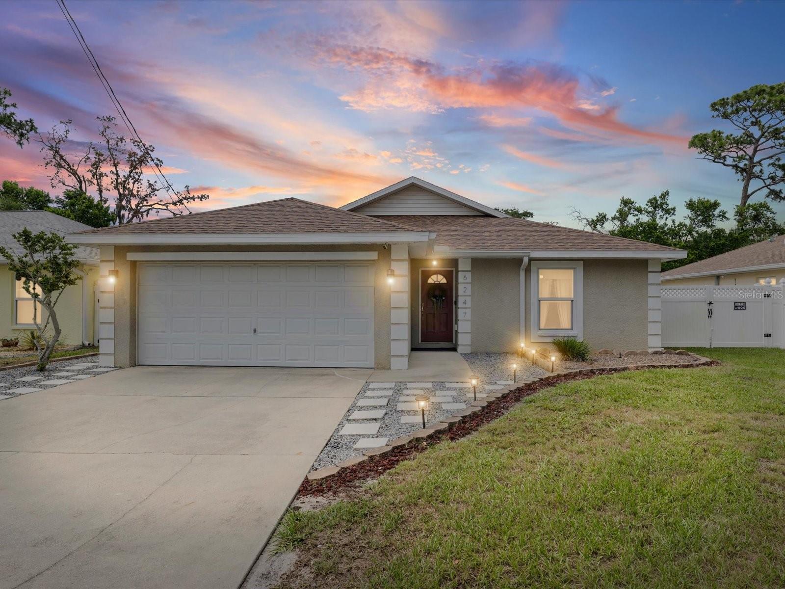 This cozy three-bedroom, two-bath concrete block home is in excellent condition, featuring a split floor plan, no HOA or CDDs, a well-maintained and beautifully landscaped backyard, and a roof redone in November of 2025.  A easy move-in home that offers comfort and ease for its future owners!