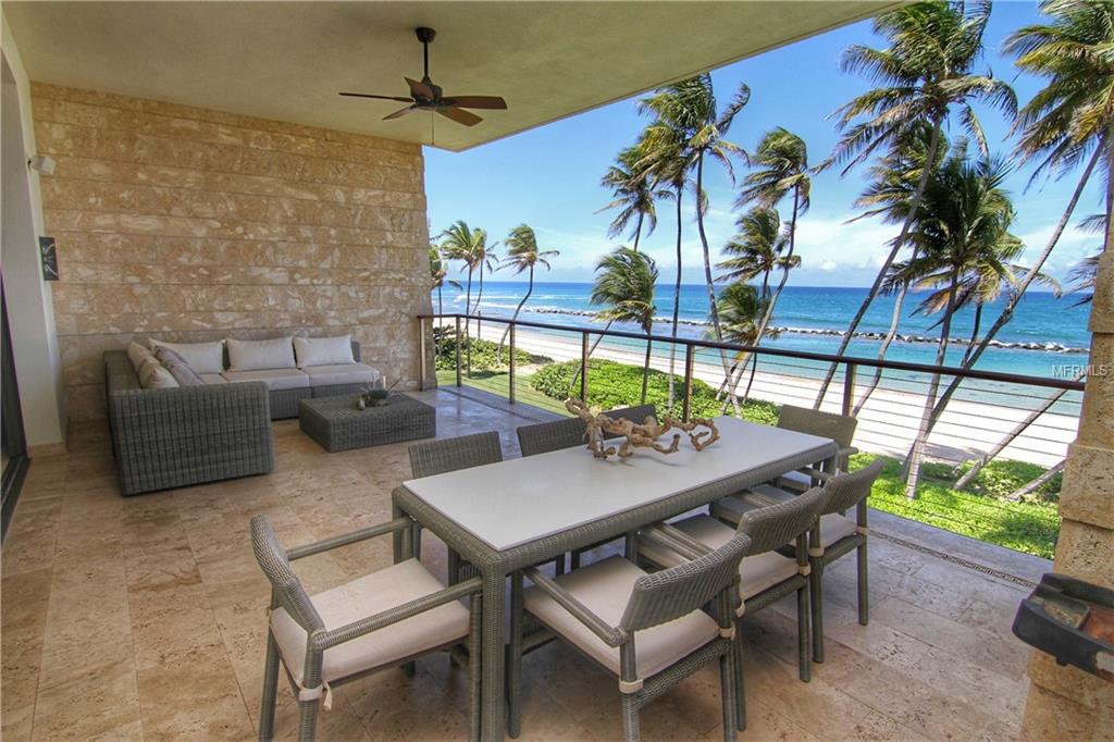 At this exquisite and exclusive West Beach apartment, a Ritz Carlton Reserve Residence, you will enjoy stunning sunset views and a spectacular golden sands beach every day!! Unwind in a beautiful landscape filled with sunshine, golfing and outdoor leisure where the possibilities to create ever-lasting memories are endless…
This luxury unit is located within the gates of the legendary Dorado Beach Resort in Puerto Rico, a sought-after exclusive place with almost two miles of beachfront, and the exclusive service of Ritz-Carlton Reserve. 
This beachfront residence features 3 bedrooms, 3.5 bathrooms, open kitchen design, living-dining room, laundry room, owner’s closet, media room, two covered shower patio areas, covered terrace, two golf cart parking areas and garage for one car. The apartment has the option to lock off one bedroom and bathroom with private secondary access.

The master bedroom has its own beachfront terrace with outdoor shower.

As soon as you open your front door, you can enjoy the ocean view through the floor to ceiling sliding doors that lead to a comfortable balcony, and listen to the waves.

• Spectacular location – stunning views of the ocean amid a tropical setting.
• Fully equipped gourmet kitchen
• Fully furnished and equipped
• Exclusive concierge service with a dedicated residential management team to attend to your every need.
• Owners also receive membership in the Dorado Beach Club.