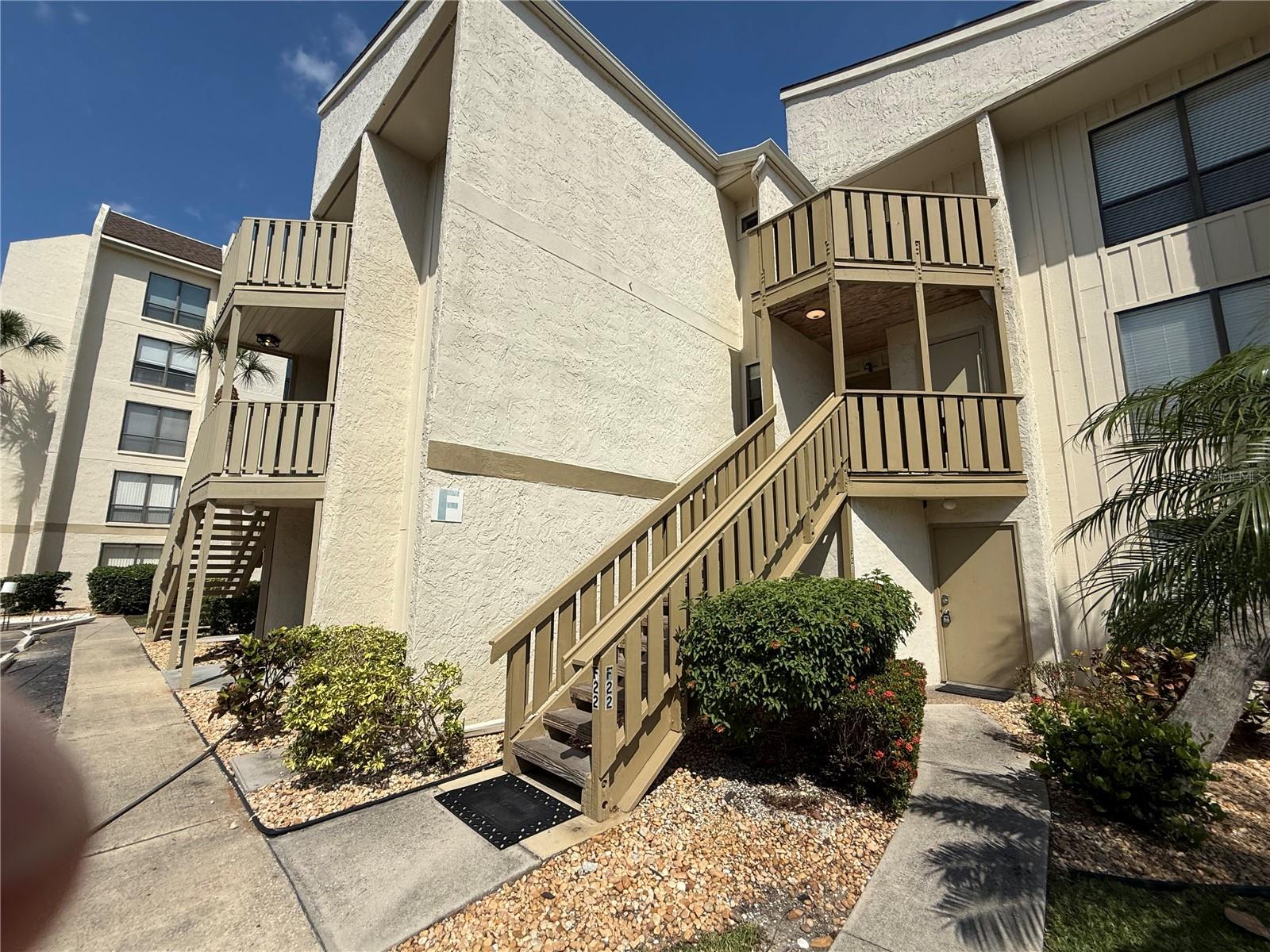 This property is a rare find, featuring two master suites upstairs, each with its own private balcony. The home is tastefully decorated and is being sold Turnkey, making it an excellent opportunity for immediate use or investment.  Notably, the property already has a strong track record of rental income with several future bookings already in place.  The Bay Oaks community offers a serene setting with mature landscaping and a wide array of amenities, including a heated pool, tennis courts, recreation room and a fishing pier. It also provides the convenience of on-site management and a picnic area with Barbeques for your enjoyment.  Located less than a mile from Crescent Beach, the property offers easy access to the world-renowned powdery, quartz sand of Siesta Key, recently ranked as the #4 beach in the world by Tripadvisor in 2025. The area is a premier destination spot.  Additionally, the trolley stops directly in front of the complex providing easy transportation to the various dining, shopping and nightlife options Siesta Key is famous for.