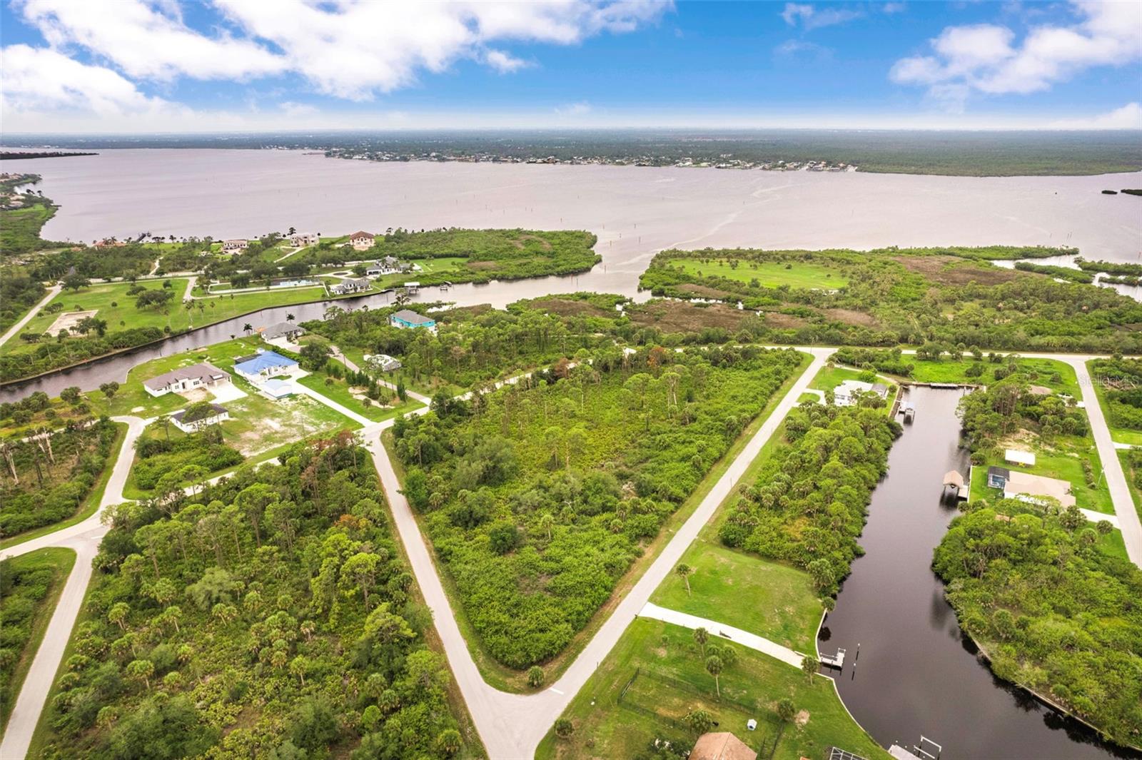 Exceptional opportunity to acquire 5.58 acres in one of Port Charlotte’s most rapidly expanding areas. Surrounded by newer residential development and ongoing growth, this property offers outstanding potential for investors, builders, and developers seeking a strategic land acquisition in Southwest Florida. With ample space and flexible possibilities, the property may be ideal for a residential development, private estate homes, or a long-term investment in a market experiencing continued demand and new construction activity. The peaceful setting provides privacy and natural surroundings while remaining conveniently close to shopping, dining, schools, healthcare facilities, and recreational amenities. Located just a short drive from the Gulf Coast's beautiful beaches, including Englewood Beach and Boca Grande, the property also offers easy access to Charlotte Sports Park, Myakka State Forest, US-41, and I-75, providing convenient connections to Sarasota, Fort Myers, and surrounding communities. As Port Charlotte continues to attract new residents, businesses, and investment, opportunities of this size and location are becoming increasingly scarce. Secure your place in the future growth of Southwest Florida and explore the possibilities this unique 5.5-acre property has to offer.