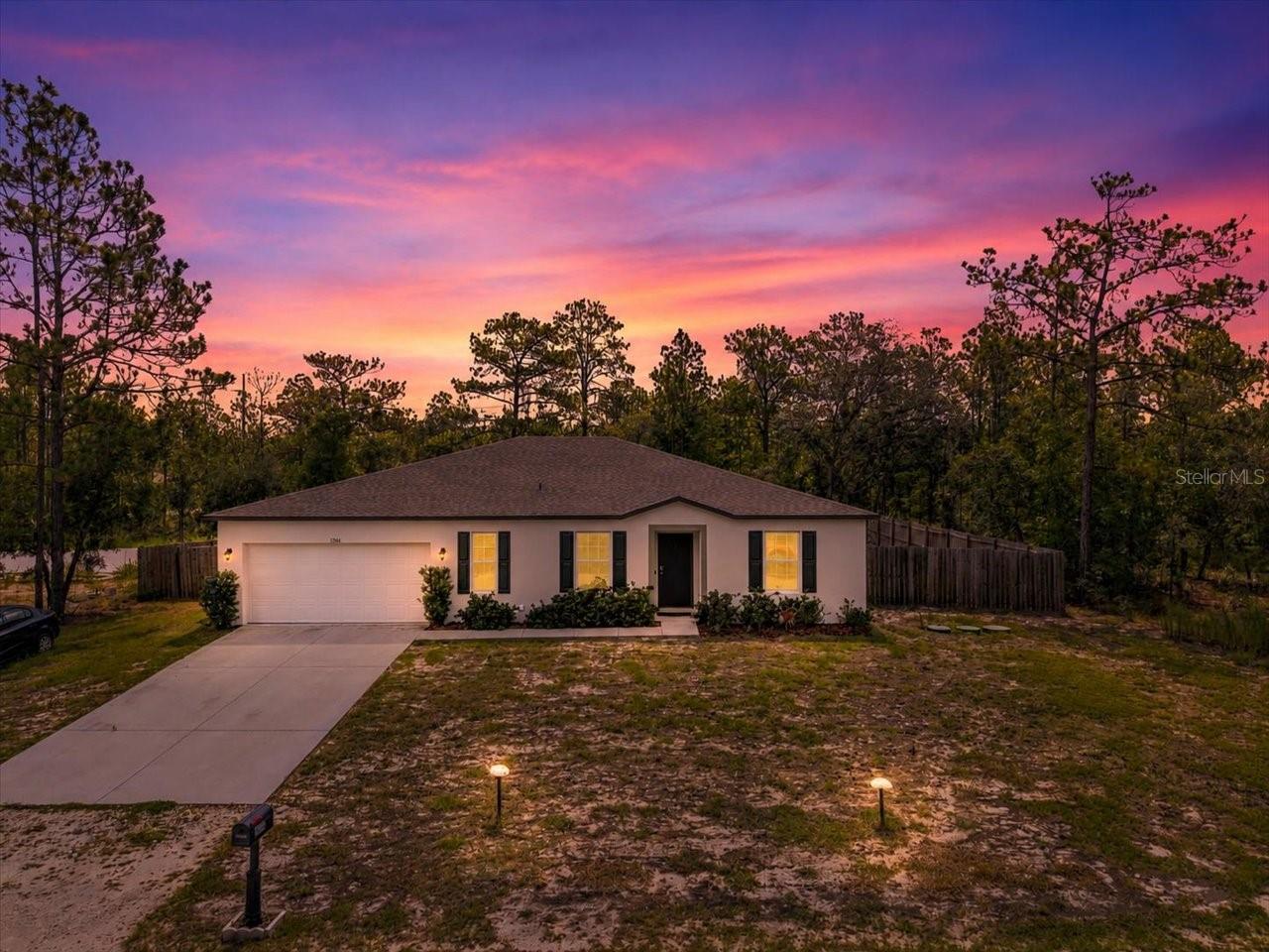 Discover this like-new, 1-owner! 2,039 Sq Ft living, 4-Bedroom Home with a FLEX SPACE and 2 Bathrooms perfectly set on a .5 Acre fenced lot! Located in the popular Royal Highlands! This Maronda Home was Built in 2023 and is turn-key ready for its new owner!
Not to mention this property comes with a Free 1 Year Americas preferred Home Warranty to give you the extra piece of mind!

Upon entering you'll find a inviting living space filled with natural light, creating a warm and welcoming atmosphere. The split floor plan offers ideal privacy, with the primary suite on one side of the home and the secondary bedrooms on the other, no waisted space in this floor plan! The main living areas flow seamlessly--connecting the living, dining, and kitchen spaces--perfect for day to day living! A big plus is its Fully tiled throughout, besides the 4 bedrooms are carpeted. Excellent if you have pets!

A gorgeous kitchen boast nice stainless steel appliances, quartz countertops, a walk-in pantry, and a large island with bar stool seating! Also a true interior laundry room! With the flex room it provides the option for a second living area, office, playroom, or even a 5th bedroom if desired!

Stepping outside to the covered back porch overlooking a large, fully privacy fenced backyard! With a lovely Hot Tub to enjoy those relaxing nights! In addition a few raised garden beds for fresh vegetables and a chicken coop! Yes! You can have fresh eggs every day! Also Fresh SOD coming soon in the front yard and other areas, and the best part of this location.... No HOA, No Deed Restrictions and No Flood Zone!
With this size property you have plenty of space for a pool, metal building and even parking for your toys, boat, RV or trailers!

Embrace the Florida lifestyle with quick access to the Weeki Wachee River, the Hernando county sportsman club, Homosassa springs or the Hernando Beach public boat ramp just a short drive away! This rural area gives you the feel of the country but is still close enough to all local conveniences! 

This property is worth the look, schedule your private showing today!