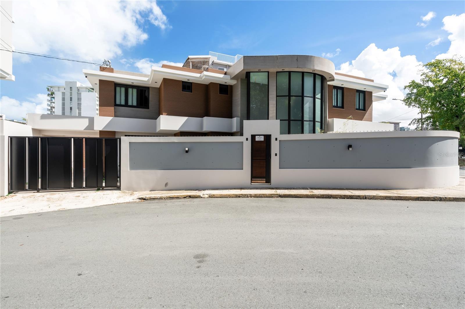 A rare and hard to find Turn key house with attention to detail, Fully furnished, move-in ready and set up for effortless living in Puerto Rico. Just walk in and start enjoying the space.This a unique home in the Condado Area. Discover the epitome of modern luxury living with triple mint finishes in the heart of Condado. This stunning property, promises an unparalleled lifestyle with its thoughtful design and prime location. Key Features: Spacious layout, with 3,600 square feet of living space spread over two levels and 2,206 square feet of outdoor space. This residence offers ample space for comfortable living and entertaining. Enjoy the luxury of five bedrooms and 4 ½ bathrooms, providing the perfect blend of privacy and comfort for your family. Modern amenities include: a well-designed kitchen, Bosch appliances, private pool, modern closets, power generator, water cistern, spacious dining room, and an indoor-outdoor garage for your convenience. Location Highlights: This home is strategically located near hospitals, schools, and essential services, ensuring your family's needs are met with ease. Beach access is available so you can embrace the coastal lifestyle with beautiful sunset views. Take a leisurely stroll or soak up the sun - the choice is yours. Explore the vibrant hotel district nearby, offering a wide variety of dining, entertainment, and cultural experiences. This property is an exceptional opportunity to invest in contemporary living in one of Puerto Rico's most sought-after neighborhoods. Crafted by a well-known, high-quality developer and construction team. Don't miss out - secure your future in this luxurious residence. Owner financing may be available!!!