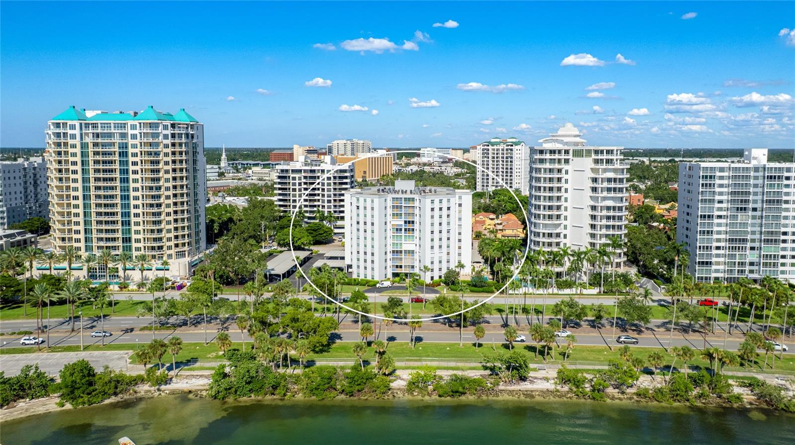 One or more photo(s) has been virtually staged. Welcome to waterfront living at Regency House, nestled in the heart of Sarasota on a serene, tree-lined street—ideally located between Gulfstream and Palm Avenue. Enjoy sweeping views of Sarasota Bay, breathtaking sunsets, and effortless walkability to the city’s premier dining, shopping, cultural attractions, and the bayfront.

This beautifully updated 1,829 sq. ft. residence is designed with both style and function in mind, featuring a spacious split floor plan that maximizes privacy. The living room opens to spectacular north- and west-facing views, where sparkling city lights, Marina Jack’s Park, and Sarasota Bay create a stunning backdrop. Thoughtfully integrated shelving adds versatility and easily adapts to a dedicated home office set up. Modern upgrades include new flooring, a fresh neutral palette, and a sleek kitchen with stainless LG appliances and a Bosch induction cooktop. With abundant storage and generous counter space, the designer kitchen is ready for everything from casual meals to lively entertaining. Each bedroom is a private retreat, offering gorgeous sunset views, updated baths, and abundant closet space—including brand-new California Closet custom buildouts. A full size, in-residence washer and dryer make this home as practical as it is luxurious and a versatile bonus/storage room provides additional flexibility for work, hobbies, or extra belongings.

 Enjoy Resort-style amenities and maintenance free living: a heated pool, fitness center, stylish club room with catering kitchen, and the peace of mind of 24/7 concierge service and a professional on-site manager provide ease of living just steps from the beautiful waterfront. This residence offers a fabulous lifestyle just moments from Marina Jack, boutique shopping and world -class dining, Opera and Theatre, Whole Foods, St. Armands Circle and Lido Beach. Enjoy the best of the Gulf Coast and peace of mind at Regency House. The building maintains healthy reserves and has completed the Milestone Inspection and Structural Integrity Reserve. Don’t miss this rare opportunity to experience vibrant downtown living with every convenience right at your doorstep.