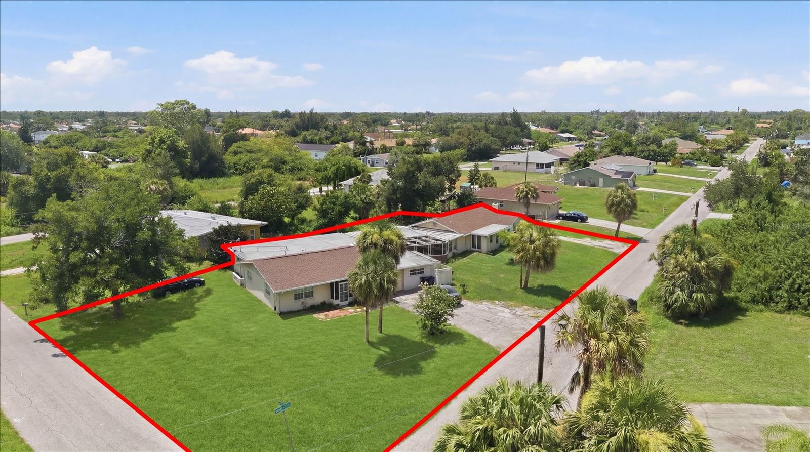Virtually Staged. Discover an exceptional opportunity with this unique and versatile property situated on a generous 0.45-acre lot in the sought-after Warm Mineral Springs area of North Port. Offering nearly 2,798 square feet of living space, this one-of-a-kind residence features 6 bedrooms, 4 bathrooms, two separate living quarters connected by a covered  pool, making it ideal for multi-generational living, extended family, guests, or income-producing potential. New AC will be installed in 07/13/2026 for UNIT A.

The spacious  pool area creates a private tropical retreat perfect for entertaining and enjoying Florida's year-round sunshine. With multiple entrances and flexible living arrangements, the possibilities are endless for homeowners or investors alike.PLACE NEEDS SOME TLC.

Conveniently located just minutes from Warm Mineral Springs, shopping, restaurants, medical facilities, parks, and everyday conveniences, with easy access to US-41, I-75, Wellen Park, CoolToday Park, and the beautiful Gulf beaches. Whether you're looking for a family compound, rental investment, or a home with room to grow, this rare property offers outstanding value and endless potential in one of Southwest Florida's fastest-growing communities.