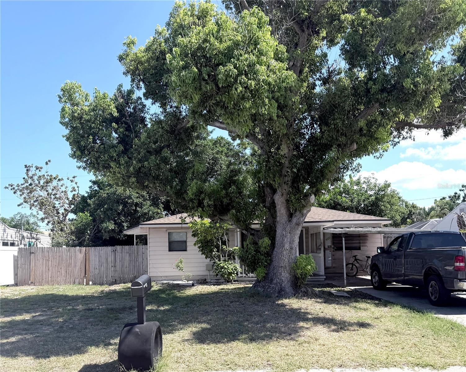 FIXER UPPER WITH LOCATION, LOCATION, LOCATION,  SOUTHGATE Location -  1 block North of Siesta Drive on East side of Trail.  This rare dead end  street has a walking trail  and is very private.   Area is undergoing redevelopment with many homes in area being totally renovated or torn down and new homes being built.   Walk to shopping center, restaurants & Brookside school and so much more. Sought after Southside Elementary is 5 minutes away.  You can be at world famous Siesta Key beach in about 10 minutes.    The home has 3 bedrooms, 2 bath, a nice back yard with stately trees.  
Bring your creativity, vision and love of the area or bring your building plans and have the home of your dreams in the neighborhood you love.This is either a redo or rebuild.   Potential