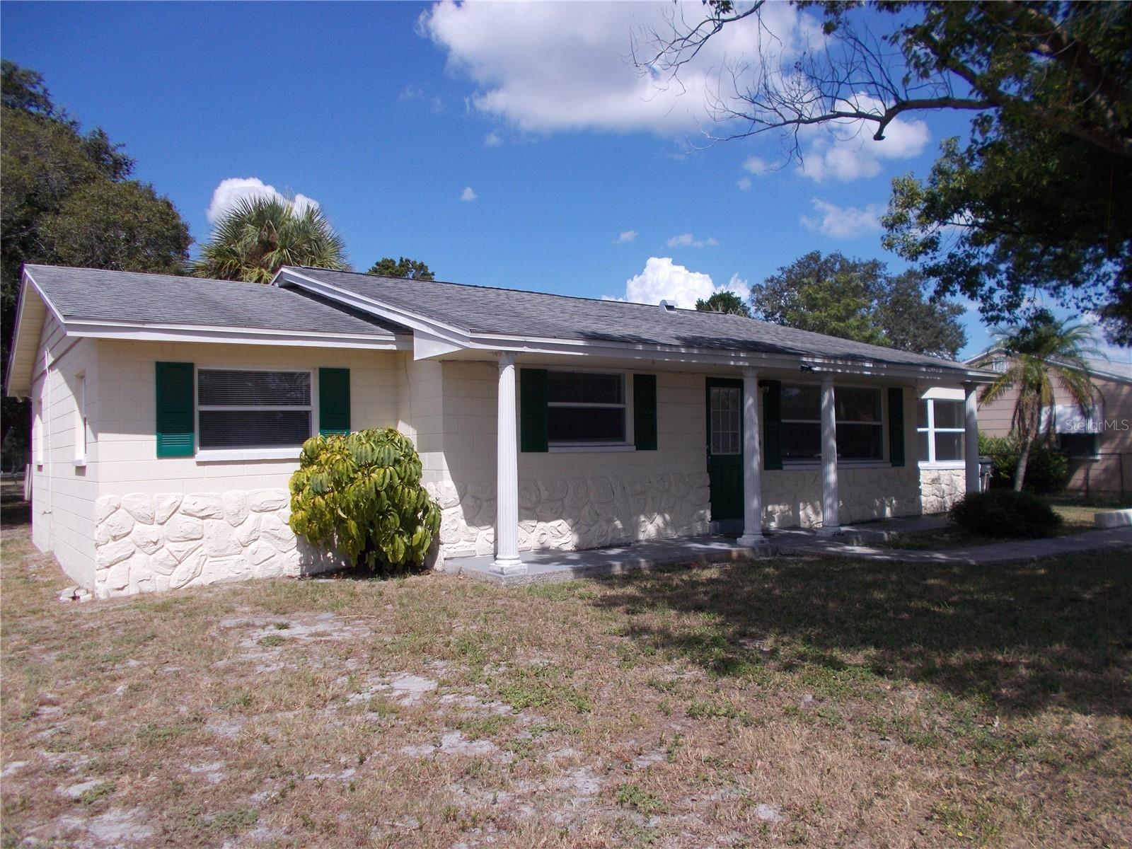 Location! Location!! Location!!! No flood insurance required here. Very spacious home 3 bedrooms,  plus a bonus room used as family room and laundry room, could easily be used as a 4th bedroom or convert back to a garage. Huge backyard with large storage room or work shop with alley access underground power, no power lines and poles!! Great house for a rental too! Main roof replaced in 2011 per public records.