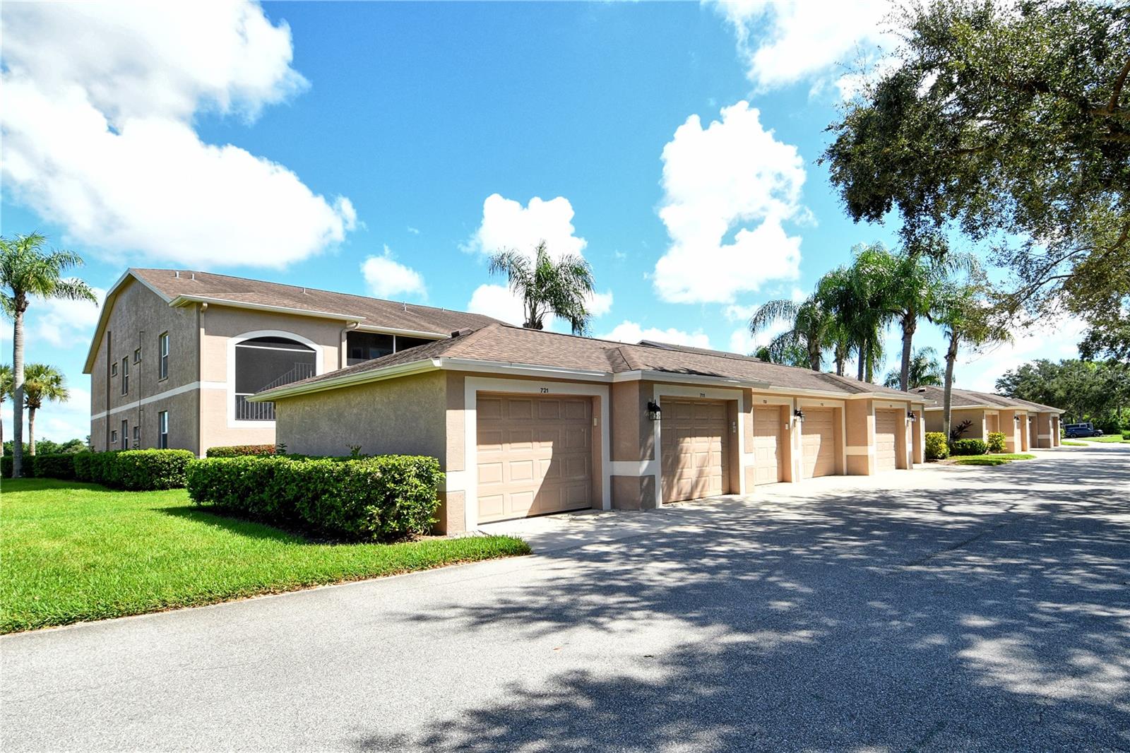 Take a look at this wonderful, Turn-Key Furnished "Abbey" unit in Heritage Oaks Golf and Country Club. This property is the largest of the verandas in the neighborhood and features 2 bedrooms, 2 bathrooms, a den/study that can be used as a wonderful flex room, and a single car garage - this unit is perfect for a seasonal owner or full time resident. As soon as you walk up to the property you'll love the fully tiled front lanai and entry that is completely screened helping keep the space extremely clean. Step inside to discover a thoughtfully laid-out floor plan where each room flows effortlessly. The generously sized living area features soaring vaulted ceilings and abundant natural light, creating an open, airy ambiance. Large windows and sliders frame views of the surrounding lakes, golf course, and preserves, connecting you to the serene landscape beyond. The kitchen provides ample space for dining and food preparation as well as wide open views to the dining and living spaces, perfect for entertaining guests and family. Conveniently enjoy coffee or breakfast at your dining nook located directly off the kitchen area. Sit back and enjoy the comfort of your oversized living space and take in some of the most amazing over-water and golf course views in the entire neighborhood, these are truly million dollar views! The northern-facing view of the 12th and 13th holes of the golf course is really something to take in! The screened rear lanai even includes an extra set of doors allowing the room to be used all 4 seasons, enhancing the usability of this amazing property. The split bedroom layout gives owners and guests an exceptional amount of privacy as the guest bedroom and bathroom are on the opposite end of the home. Watch the abundance of wildlife that roam this Certified Audubon Neighborhood right in your backyard. Heritage Oaks is known for its pristine 18-hole golf course, har-tru tennis courts, fitness center, 24-hour security, an impressive recently renovated clubhouse with a lovely restaurant and the sensational redesigned 19th Hole Lounge, 5 swimming pools, and a calendar of events packed with activities. Don't wait, schedule your private showing on this gorgeous unit today!