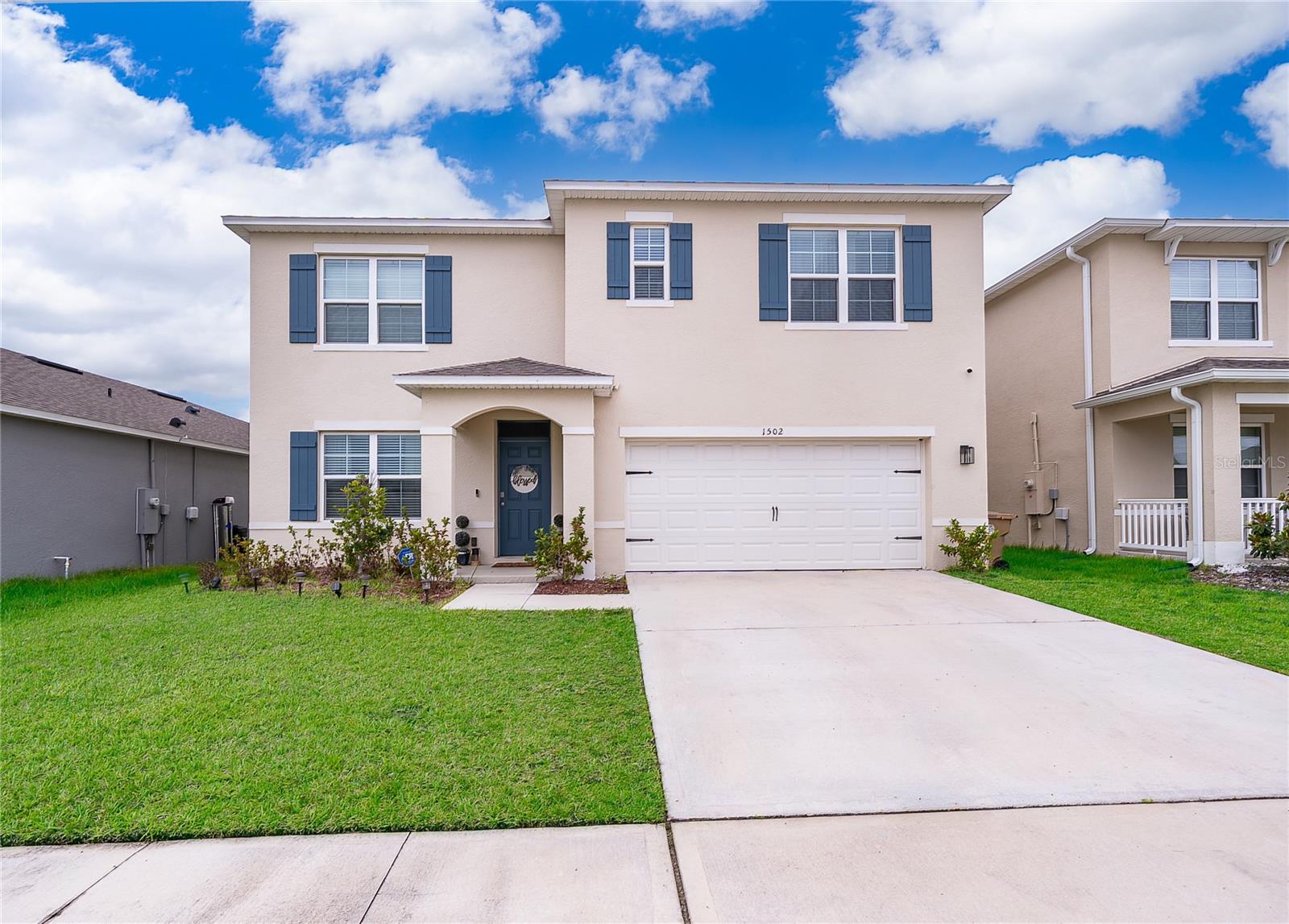 Seller is offering a concession of up to $14,000 for buyers to use towards closing costs, rate buy downs and prepaids. 

Step into modern elegance with this stunning 2024-built residence, thoughtfully designed to blend sophisticated style with everyday comfort. Offering 5 spacious bedrooms, 3 full bathrooms, and over two levels of beautifully appointed living space, this home delivers the perfect balance of functionality and luxury.

From the moment you enter, you'll be captivated by the dramatic soaring ceilings and grand foyer that create a bright, open atmosphere. The formal dining room provides an ideal setting for hosting memorable gatherings, while the expansive open-concept living area seamlessly connects to the heart of the home—a chef-inspired kitchen designed to impress. Featuring gleaming stone countertops, stainless steel appliances, a generous center island with bar seating, and a sunny breakfast area, this space was built for both entertaining and everyday living.

A private first-floor bedroom and full bath offer the perfect retreat for guests, extended family, or a dedicated home office. Upstairs, the luxurious owner's suite serves as a peaceful sanctuary, complete with an oversized walk-in closet and a spa-like en-suite bath featuring dual vanities and ample space to unwind. Three additional bedrooms, a versatile loft ideal for a media room or play area, a full guest bath, and a conveniently located upstairs laundry room complete the second level.

Step outside to enjoy the expansive backyard and oversized concrete patio, providing endless possibilities for outdoor entertaining, weekend barbecues, or simply relaxing under the Florida sunshine.

Adding to the home's appeal, residents enjoy the convenience of a highly desirable K-8 school located within the community. Modern smart-home technology allows you to control the garage door, entry locks, lighting, and HVAC system directly from your smartphone, while the integrated security camera system offers added peace of mind.

Combining contemporary design, smart technology, and an exceptional floor plan, this move-in-ready home presents an incredible opportunity to enjoy the very best of Florida living. Schedule your private showing today!