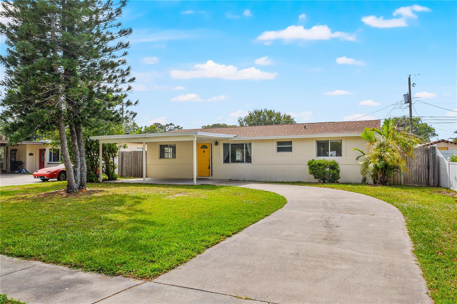 NO RENTAL RESTRICTIONS in Unincorporated St. Petersburg! Whether you're searching for the perfect primary residence, vacation getaway, or income-producing investment property, this exceptional 4-bedroom, 2-bath home offers endless possibilities.  Ideally located just minutes from the sugar-white sands of Madeira Beach and the popular John’s Pass Village & Boardwalk, this property combines the best of Florida living with outstanding investment potential. Situated in a sought-after unincorporated area of St. Petersburg, the home offers the flexibility and freedom that investors and homeowners alike are looking for—plus no flood insurance is required.  Step inside and be welcomed by a spacious, open-concept floor plan designed for both comfortable everyday living and effortless entertaining. The beautifully updated kitchen features stylish cabinetry, modern finishes, and abundant workspace, flowing seamlessly into the expansive living and dining areas. A charming fireplace serves as the focal point of the home, creating a warm and inviting atmosphere for gatherings with family and friends.  Throughout the residence, durable ceramic tile and laminate flooring provide both elegance and easy maintenance. Outside, a stunning new pergola transforms the backyard into a private outdoor retreat, perfect for alfresco dining, morning coffee, or relaxing evenings under the Florida sky.
With generous living spaces, a prime location near world-class beaches, shopping, dining, and entertainment, and exceptional short-term rental potential, this versatile property is a rare opportunity. Experience the Florida lifestyle you've been dreaming of while enjoying the flexibility, convenience, and investment advantages this remarkable home has to offer. Don't miss your chance to make it yours!