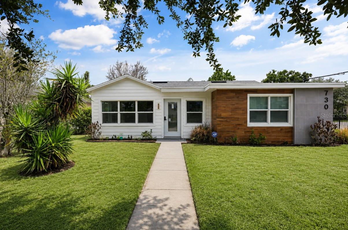 Virtually Staged. Stylish Mid-Century Modern gem in the heart of Winter Park, minutes from Park Ave! Fully renovated corner lot home featuring 5 beds/3 baths, 2,132 SF of CBS block construction. Prime location just 3 blocks from iconic Park Avenue, minutes from Winter Park Village, Rollins College, Publix, Trader Joe's, Whole Foods & AdventHealth. Zoned for top-rated Lakemont Elementary, Maitland Middle & Winter Park High. Currently operating as a fully occupied income-producing PadSplit co-living property generating up to $5,664/month gross at full occupancy — ideal for investors seeking turnkey cash flow. New 4-ton A/C (2025), permitted renovation, modern kitchen with convection oven, dishwasher, range & refrigerator, updated bathrooms, luxury finishes throughout. On-site laundry, high-speed WiFi, driveway & street parking. Corner lot with abundant natural light, north exposure, open floor plan. No HOA. No CDD. No flood insurance required. Walking distance to WP9 Golf Course, SunRail station & Central Park. Interested in living in the home yourself? Contact listing agent to discuss options.