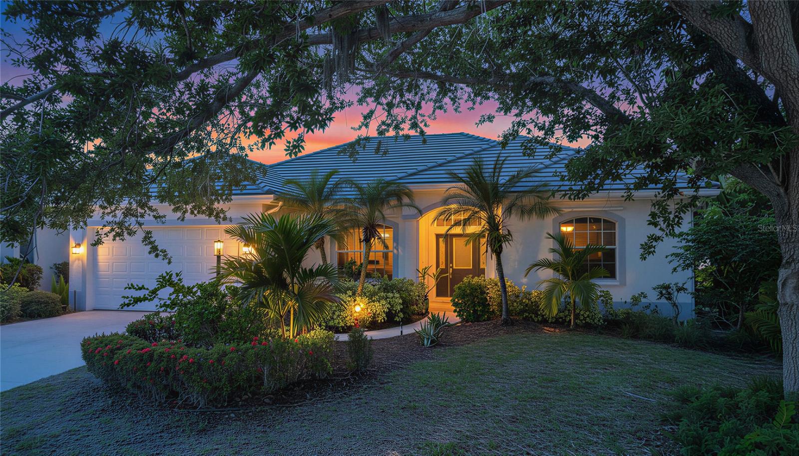 Welcome to your private slice of paradise in the Venice Golf & Country Club, where luxury living meets an lively, resort-style lifestyle (membership required). This beautifully updated 3-bedroom, 3-bathroom home with a versatile bonus-room and spacious 2.5-car garage sits on a premium corner lot, offering exceptional privacy with no direct views of neighboring homes. Surrounded by lush landscaping and located on a picturesque tree-lined street, the setting is as peaceful as it is elegant. Step inside to discover over $120,000 in recent renovations, including brand-new tile flooring throughout and fully remodeled bathrooms designed with modern sophistication. The luxurious primary suite is a true retreat, featuring a spa tub, stunning marble accent wall in the walk-in shower, and dual his-and-hers vanities. Enjoy Florida living at its finest in your private pool area, where you can unwind daily with breathtaking sunset views. Whether entertaining guests or relaxing after a day on the course, this outdoor space delivers the perfect backdrop. Additional highlights include a new roof (2025), ensuring peace of mind for years to come. As a resident, you’ll enjoy exclusive access to this private, member-owned country club community, featuring: --An 18-hole championship golf course with mature landscaping --Clay tennis courts and New Bocce Court --A junior Olympic-size pool with lap lanes --A brand-new fitness center, yoga studio, and barre room --A vibrant social scene with dining, full service bar, snack bar and waiter service by the pool and regular events --Fire pit A safe, guard-gated entrance Located just a short drive from multiple pristine Gulf beaches and an abundance of dining and shopping options, this home is also situated within a school district, short drive to hospital, and short distance to Wellen Park. This is more than a home—it’s a lifestyle.