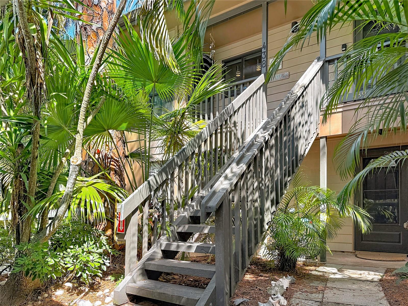 Sarasota's best kept secret, Pelican Cove. An artistic and socially active community located on 75 acres with 731 condos, 3 clubhouses, 6 pools, tennis and pickle ball courts, an exercise facility, 85-slip marina and stunning tropical grounds. Look no further, your completely renovated 2/2 Glenhouse condo awaits. Upgrades galore, all new hurricane windows throughout complimented with Hunter Douglas motorized window treatments, beautiful Faus laminate floors, custom kitchen cabinets, granite counter tops, new A/C unit 2024 (handler & ductwork) New electrical panel 2022, 6-panel doors throughout, large dining room skylight, and an attic that is retrofitted for storage with a double insulated staircase for access. An opportunity to live in paradise minutes from downtown Sarasota and beaches. Don't miss out on this move-in ready condo, schedule a showing today!