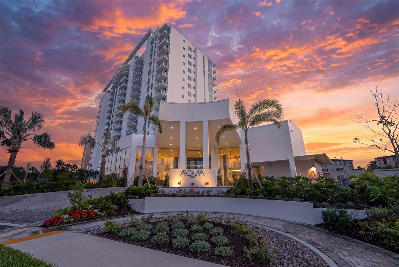 Introducing AQUA at Westshore Yacht Club on the grounds of the exclusive gated waterfront community in South Tampa. Residence #1004 a 3 bedroom, 3.5 bath plus a den with 2,411 Sq. Ft and an additional East facing terrace accessed from the 3rd bedroom. Westshore Yacht Club’s newest residential tower: standing 17 floors, offering 77 luxurious condominium residences with sweeping sunset views and sunrise city views. Secure fob private elevator that opens into your private entry foyer. Interiors boast the finest finishes such as Italkraft premium cabinetry, quartz waterfall countertops, large format porcelain tile, Sub-Zero and Wolf appliances with induction stove top. Wide-open sun filled living and dining rooms with floor to ceiling windows and sliders accessing the West facing terrace, offering amazing sunset and Bay views. Generously sized Owner’s Suite enjoys 2 walk-in closets, spa-inspired Owner’s bath with large walk-in-shower and freestanding soaking tub, private lavatory enclosure, 2 separate vanity locations with premium fixtures. Amenity rich, the building features a rooftop sky pool with bay views and private cabanas, with breathtaking views of Old Tampa Bay, plus a 3rd floor pool with spa, outdoor grilling station and lounge area.  Spacious and elegantly appointed club room with conversational seating areas, sports lounge and billiard area and private dining room. State of the art golf simulator, theater with plush seating, private offices, children’s playroom and 2 fully furnished guest suites. Bay Front fitness center on the 17th floor with yoga and spin room. Climate controlled storage for each residence on the same level. Residents and guests will be welcomed by valet attendant under the covered porte-cochere entrance leading to the residential lobby, with signature ceremonial staircase that leads to the second floor lounge library. 24/7 staffed lobby, on site property manager and service personnel ensure an effortless lifestyle. Westshore Yacht Club is South Tampa’s premier unique Gated waterfront community, boasting the exclusive members-only Bay Club and Marina, 175 boat slips, two resort style swimming pools, outside Tiki Bar, and indoor fine dining, 806 Sunset bar, Day Spa, fitness center, community, and dog parks. All this and only 30 minutes to the beaches, 15 minutes to downtown Tampa and St. Petersburg, as well as Tampa and St. Pete Airports, and all the restaurants & shopping Tampa Bay has to offer.