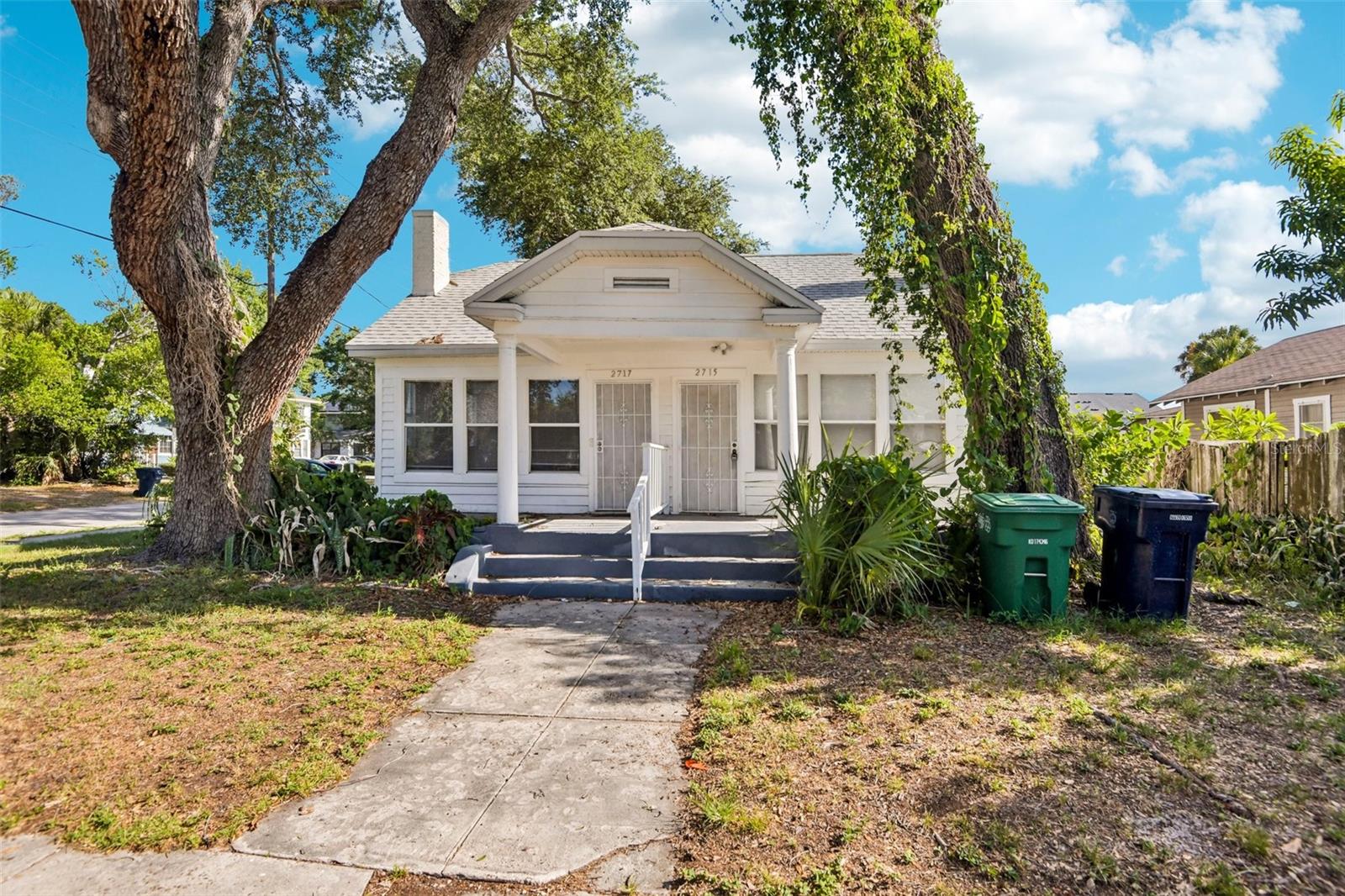 **Investment Opportunity in the Heart of Tampa!** This charming 1924 bungalow offers exceptional flexibility and income potential, currently configured as two separate 1-bedroom, 1-bathroom living units measuring approximately 760 and 744 square feet. With a proven rental history generating nearly $3,000 per month, this property is ideal for investors seeking immediate cash flow or buyers looking to explore future possibilities. Each unit features its own private entrance from the classic Florida front porch and includes a spacious living room, full kitchen, bathroom, and comfortable bedroom. A brand-new roof installed in 2025 provides added peace of mind, while the property's timeless character creates an inviting foundation for future enhancements. Ideally situated just north of Kennedy Boulevard, you'll enjoy quick access to South Tampa, West Tampa, Downtown Tampa, the Westshore Business District, Midtown Tampa, Tampa International Airport, and an outstanding selection of local restaurants, shopping, and entertainment. Whether you're looking to expand your investment portfolio or unlock the full potential of this historic property, this is an opportunity you won't want to miss.