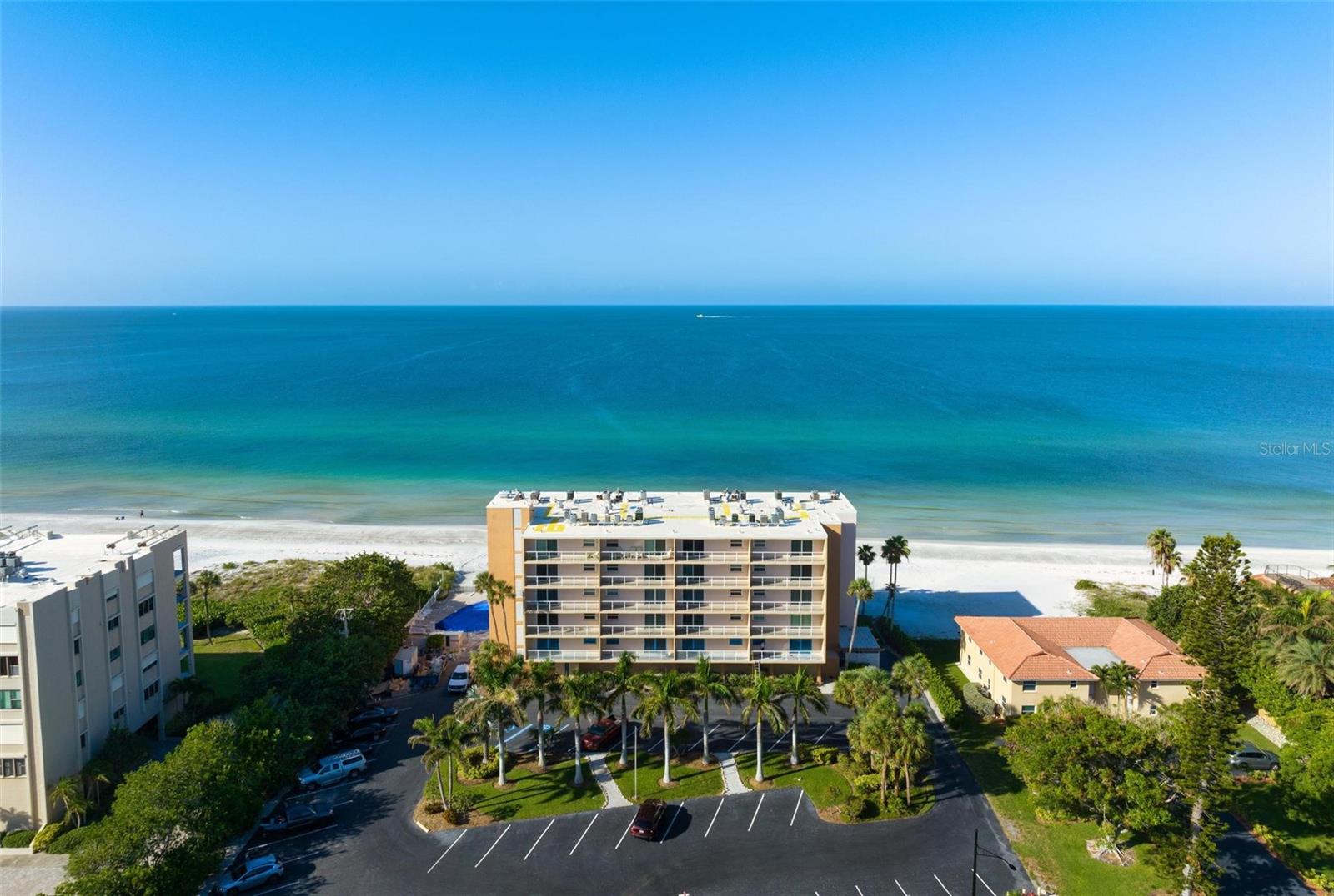Discover a Rare Gem on Longboat Key: This investment opportunity is a true standout. Rental bookings January – Early April total $36,000 With weekly rentals allowed year-round, an onsite rental office for seamless management without the management cost, and a prime 6th-floor location offering Bay views, this property is a true treasure. Step onto one of two expansive 25’ x 6’ balconies, perfect for taking in the breathtaking scenery. Inside, experience a renovated unit featuring stainless appliances and elegant bamboo floors throughout. This 3-bedroom, 2-bath haven includes a Master Bedroom with its own living area, wet bar, and fridge—a delightful space for morning coffee, home office or evening relaxation  The building's enviable location offers 200 feet of Gulf front beach access, making every day a beach day. Enjoy the convenience of a heated Community Pool on the beach side, and take a leisurely stroll to nearby amenities like Publix, CVS, and Longboat Key Community Tennis courts. This turnkey furnished property is a perfect slice of paradise, providing both a personal retreat and rental income potential.  Additional features include two storage closets as this condo was originally two units), and impact windows throughout. Don't miss this opportunity to own a piece of Longboat Key's idyllic lifestyle