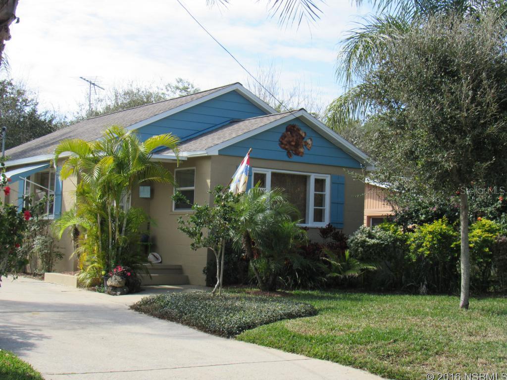 Adorable North Beach Cottage with lots of charm and character! Located in the beach side Historic District, this home is just a short walk to Flager Avenue were you enjoy the laid back,  New Smyrna Beach lifestyle!  You can walk, or ride your bike to enjoy the numerous boutiques, spas, restaurants, taverns and shops. Or if you prefer, you can hit the beach & go surfing, swimming, sunning or take a nice walk on our beautiful beach!  This Florida Charmer is in the absolute perfect location! It is close to the beach, the river & Flager Avenue.  It is a  pristine home, that features a fun, spacious, outdoor entertainment deck complete with a colorful Tiki bar, fire pit and a hot tub for 6! This home definitely has the "Island Flare!" It features a newer roof, windows, electrical & plumbing systems, cabinets, irrigation system, a fenced back yard and storage shed. The back yard does have room for a pool or a nice additions. This could be your perfect beach get-a-way, a great rental property or a charming residence just for you! ;Water: City