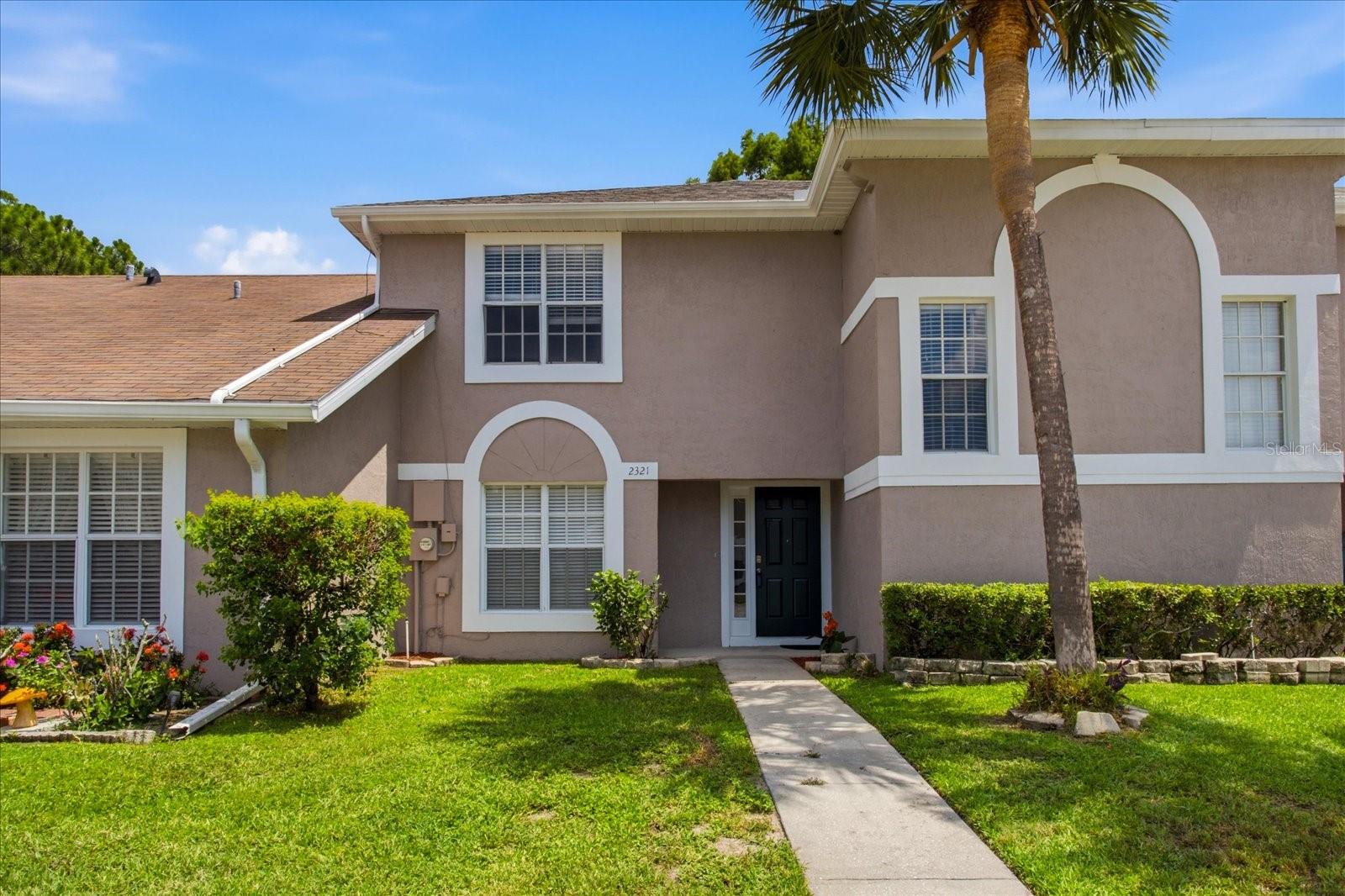 Zoned for both short-term and long-term rentals, this property offers an excellent opportunity for investors or homeowners alike. Ideally located just 35 minutes from Walt Disney World and other major Disney theme parks, 19 minutes from Orlando International Airport, and within an easy drive of Florida's beautiful beaches. Inside, you'll find a renovated kitchen featuring granite countertops, a 4-piece appliance package, and a spacious pantry closet. Additional highlights include a screened rear patio with a storage closet overlooking a tranquil pond, a stylish laminate staircase with under-stair storage, an indoor laundry room, new carpet in all bedrooms, and fresh interior paint throughout. 
All three bedrooms are conveniently located on the second floor. The property also includes two assigned parking spaces plus ample guest parking (RV and boat parking are not permitted). Enjoy low HOA fees of just $160 per month, along with a master association fee of only $350 annually. Whether you're looking for a primary residence, vacation home, or income-producing investment, this property combines location, updates, and rental flexibility in one outstanding package.