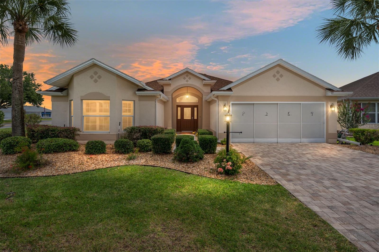 BOND PAID with a NEW HVAC (2026), ROOF (2022), and HOT WATER HEATER (2025)! Welcome to this BEAUTIFULLY UPDATED, 3-BEDROOM, 2-BATH LANTANA Designer home perfectly positioned on a desirable CORNER HOMESITE along a quiet CUL-DE-SAC street. Combining major updates, exceptional curb appeal, and an unbeatable location, this move-in-ready home offers the ideal Florida lifestyle.
Step inside to discover a bright and inviting interior featuring VOLUME CEILINGS, ALL NEW LVP FLOORING throughout, FRESH INTERIOR PAINT, PLANTATION SHUTTERS, and CROWN MOLDING throughout. The clean, modern design is complemented by abundant natural light and the convenience of no carpeting to maintain. Abundant windows and a thoughtfully designed layout create a warm and welcoming atmosphere, while the spacious open floor plan is ideal for both everyday living and entertaining.
At the heart of the home, the beautifully updated kitchen showcases GRANITE COUNTERTOPS, CROWN-MOLDED CABINETRY, STAINLESS STEEL APPLIANCES, convenient PULL-OUT SHELVING, modern finishes, and a SOLAR TUBE that enhances the already light-filled space.
The updates continue in both bathrooms, featuring UPDATED CABINETRY, QUARTZ COUNTERTOPS, and stylish NEW FIXTURES. The spacious primary suite offers a HUGE WALK-IN CLOSET with CUSTOM CALIFORNIA CLOSETS, providing exceptional organization and plenty of storage for clothing, accessories, and all of life's extras.
The indoor laundry room offers additional flexibility with space for a small office, hobby area, or additional storage.
Enjoy the best of indoor-outdoor living in the SCREENED LANAI with ELECTRIC AWNING—perfect for morning coffee, evening cocktails, or simply relaxing while enjoying Florida's beautiful weather year-round. Additional upgrades include an ECHO WATER SYSTEM for added comfort and convenience.
Outside, the attention to detail continues with a PAVER DRIVEWAY AND WALKWAY, MATURE LANDSCAPING, SCREENED GARAGE DOOR, and NEWLY PAINTED GARAGE FLOOR AND WALLS, creating exceptional curb appeal and showcasing the pride of ownership found throughout this meticulously maintained home.
Conveniently located near shopping, dining, medical facilities, and everyday conveniences, this exceptional property is ideally situated between several of The Villages' most popular destinations, including GLENVIEW COUNTRY CLUB, the ARNOLD PALMER CHAMPIONSHIP GOLF AREA, and THE POLO CLUB. Golf enthusiasts will appreciate the multiple championship golf courses nearby, while active residents will enjoy easy access to SADDLEBROOK RECREATION CENTER, pickleball courts, swimming pools, fitness facilities, and countless clubs and activities.
Experience the unparalleled lifestyle of The Villages, Florida's premier 55+ active community, renowned for its endless recreation, vibrant social atmosphere, nightly entertainment, and opportunities to stay as active and engaged as you choose.
Golf cart accessible to shopping, dining, recreation centers, championship golf courses, medical facilities, the library, and many of the everyday conveniences that make The Villages lifestyle so desirable.
THIS IS THE LANTANA YOU'VE BEEN WAITING FOR.