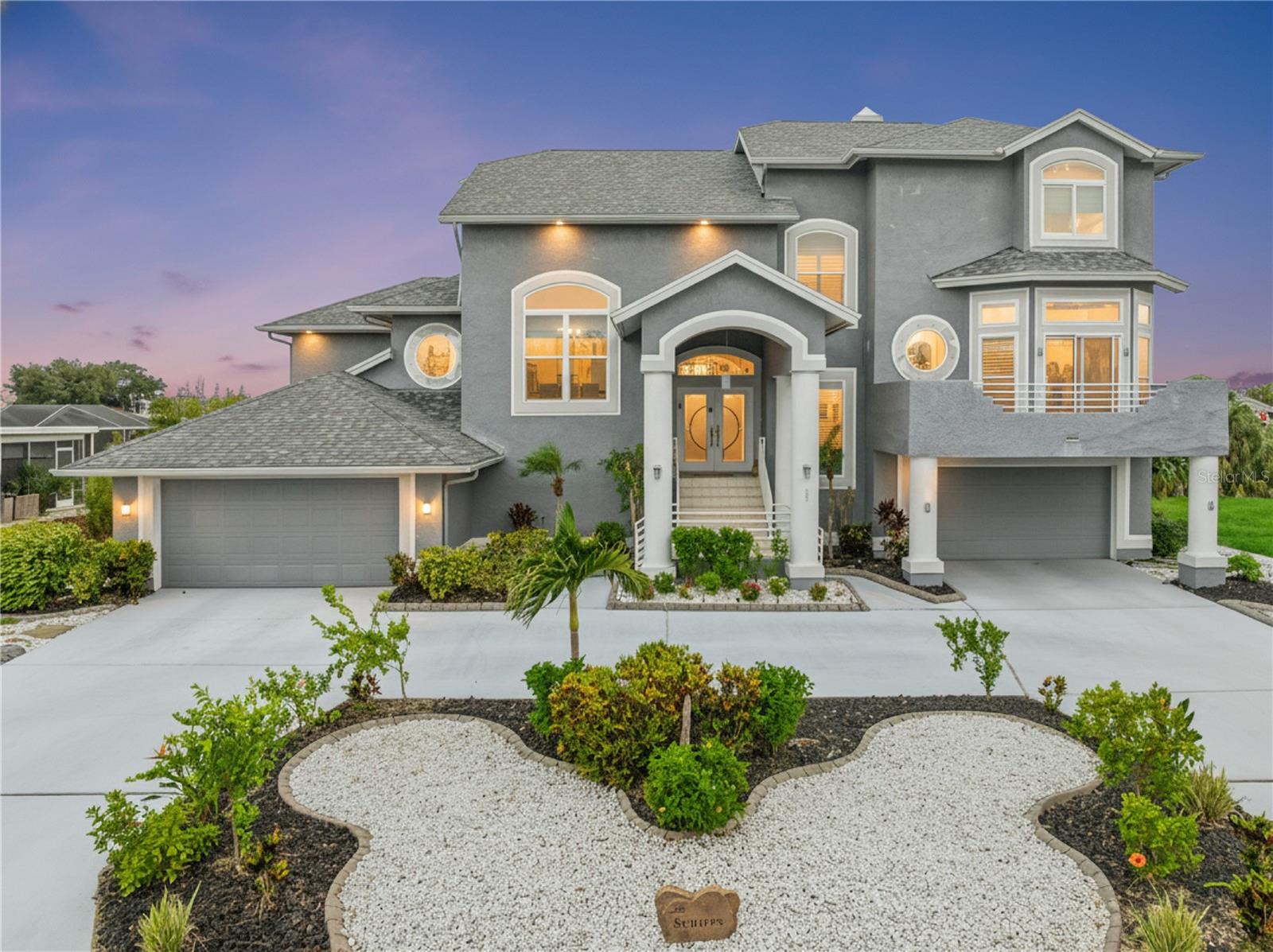 Experience exceptional waterfront living in the heart of Apollo Beach. Perfectly positioned on a deep-water canal with quick access to Tampa Bay and no fixed bridges, this beautifully updated 4-bedroom, 2.5-bath residence offers the ideal blend of boating lifestyle and everyday comfort.

Inside, you'll find a thoughtfully remodeled interior featuring an updated kitchen with modern finishes, renovated bathrooms, and spacious living areas designed for both entertaining and relaxation. Large windows and waterfront views create a seamless connection between the indoors and the coastal setting beyond.

Step outside to enjoy your private waterfront retreat, where dolphins and manatees are frequent visitors along the seawall and dock. The deep-water canal is suitable for a variety of vessels, including sailboats, making this an excellent opportunity for boating enthusiasts seeking convenient access to Tampa Bay and the Gulf beyond.

Car collectors, hobbyists, and boating enthusiasts will appreciate the impressive garage space, including a 4-car garage plus an additional rear-access garage that provides convenient storage and access for waterfront equipment and gear. Between the garage and pool area, a versatile flex space currently serves as a gym and can easily accommodate a variety of lifestyle needs.

The outdoor living area is designed to maximize Florida waterfront living, featuring a pool, generous deck space, and multiple areas to gather while enjoying water views and coastal breezes.

Located in a well-established waterfront community with no HOA and no CDD fees, this property offers the freedom to enjoy the Florida lifestyle without additional community restrictions. Conveniently located near shopping, dining, parks, and major commuter routes, this is a rare opportunity to own a move-in-ready deep-water waterfront home in Apollo Beach.