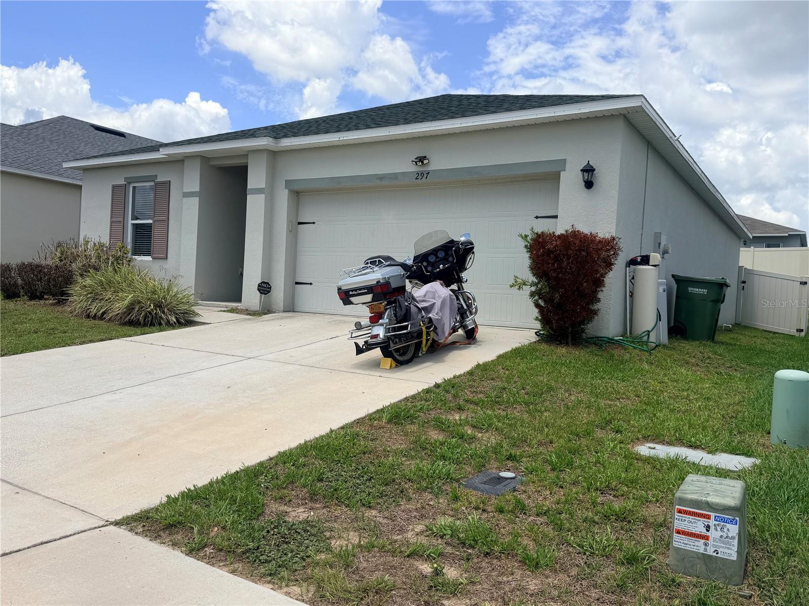 Welcome to 297 Meadowbrook Boulevard, a well-maintained 3-bedroom, 2-bathroom home located in the Lucerne Park Reserve community of Winter Haven. Built in 2020, this single-story residence offers approximately 1,408 square feet of comfortable living space with a functional, open-concept floor plan designed for everyday living and entertaining. The kitchen flows seamlessly into the main living and dining areas, creating an inviting central gathering space. The primary suite features a private bathroom and generous closet space, while two additional bedrooms provide flexibility for guests, a home office, hobbies, or additional living needs. A two-car attached garage offers convenient parking and storage. Residents can enjoy access to community amenities, including a swimming pool and playground. Conveniently situated near shopping, dining, schools, recreation, and major roadways, this property provides easy access to Winter Haven and the surrounding Central Florida area. Schedule your private showing today and explore everything this home has to provide!