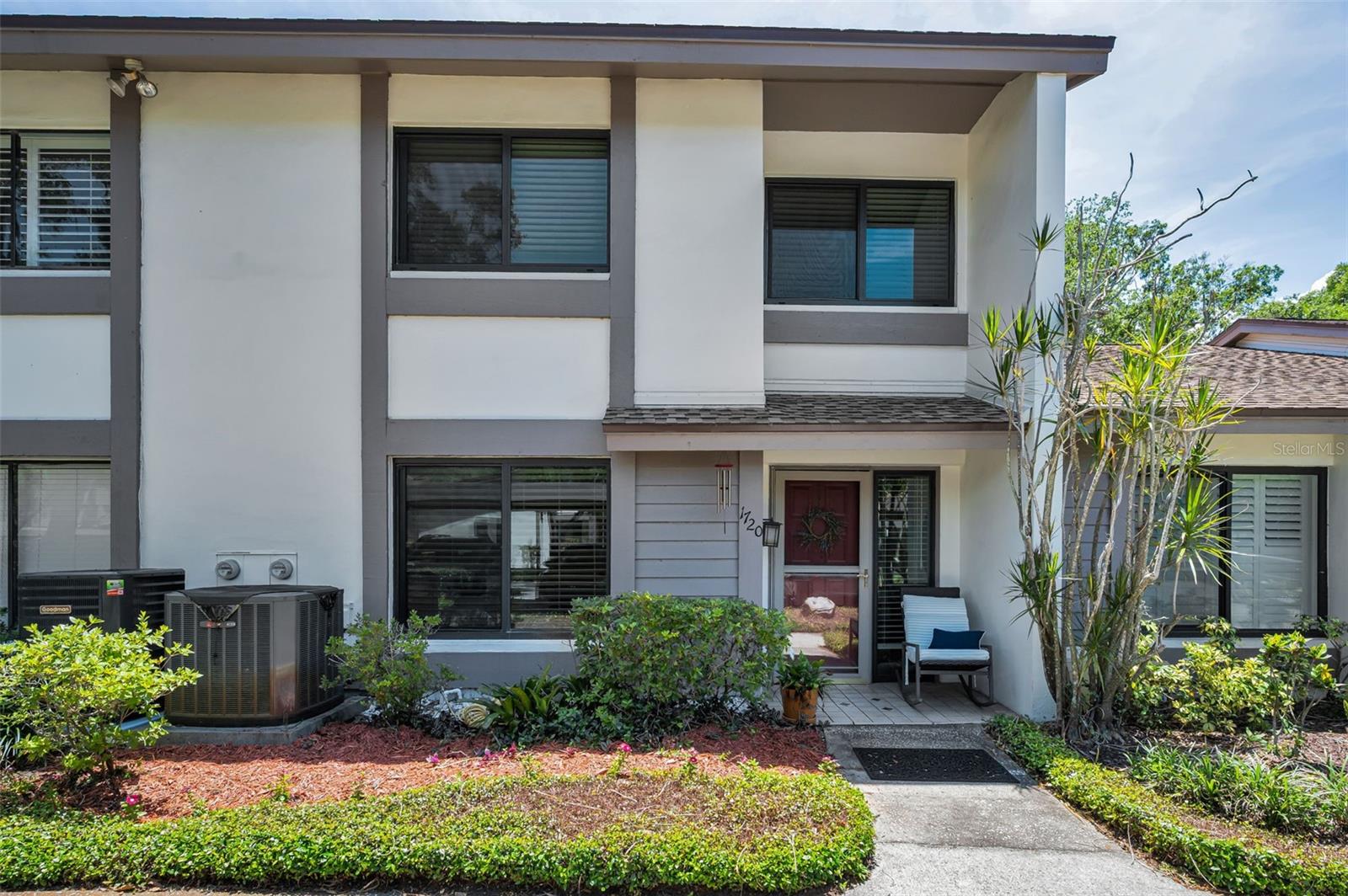 Welcome to Florida living in the heart of Safety Harbor. This beautifully updated 2-bedroom, 2-
bath townhome with versatile loft space offers 1,415 square feet of stylish comfort in one of the
area’s most sought-after communities. Step inside to soaring ceilings, welcoming natural light,
and an inviting open-concept layout accented by updated wood floors throughout most of the
home, including the stairway. The spacious living room and adjacent Florida room (128 sf not included
in square footage) feature abundant windows that create a bright, airy atmosphere perfect for
relaxing or entertaining. The convenient first-floor bedroom features charm and privacy with
chair rail and vibrant color, while the adjoining dining area flows into the thoughtfully renovated
kitchen, which boasts ample storage in the custom-made solid wood maple cabinetry, rich
granite countertops, newer appliances including a double oven range, recessed lighting, and a
convenient breakfast bar for casual dining. Upstairs, an open loft overlooks the living area
below, offering the perfect flex space for a home office, reading nook, or guest space. The
oversized primary suite stretches 20 feet long and features an updated en-suite bath with
marble tile finishes, solid wood cabinetry, walk-in shower, and an expansive walk-in closet with
mirrored doors, and more! Enjoy peaceful wooded and creek views from the fully enclosed
Florida room with plantation shutters, where warm tile flooring and ample storage create a
serene escape. The washer and dryer are conveniently located just off the lanai. Residents enjoy
exceptional maintenance-free living, with HOA fees covering exterior
maintenance, roof, exterior painting, water, sewer, trash service, lawn care, basic cable, a community pool, cabana, and hot tub. Located in an X flood zone, no flood insurance is required. Additional updates include an updated electric panel and newer roof completed in 2018. This is a townhome with FEE SIMPLE ownership — not condo ownership, which means you own the land and qualifies for VA loans. Your exclusive EV charger is installed near the carport for convenient charging of your electric vehicle. A rare opportunity to enjoy updated style, tranquil surroundings, and unbeatable convenience in charming Safety Harbor. Ideally located just minutes from world-class beaches, shopping, Tampa International Airport, St. Pete–Clearwater International Airport, downtown Tampa, and St. Petersburg. Room sizes are approximate.