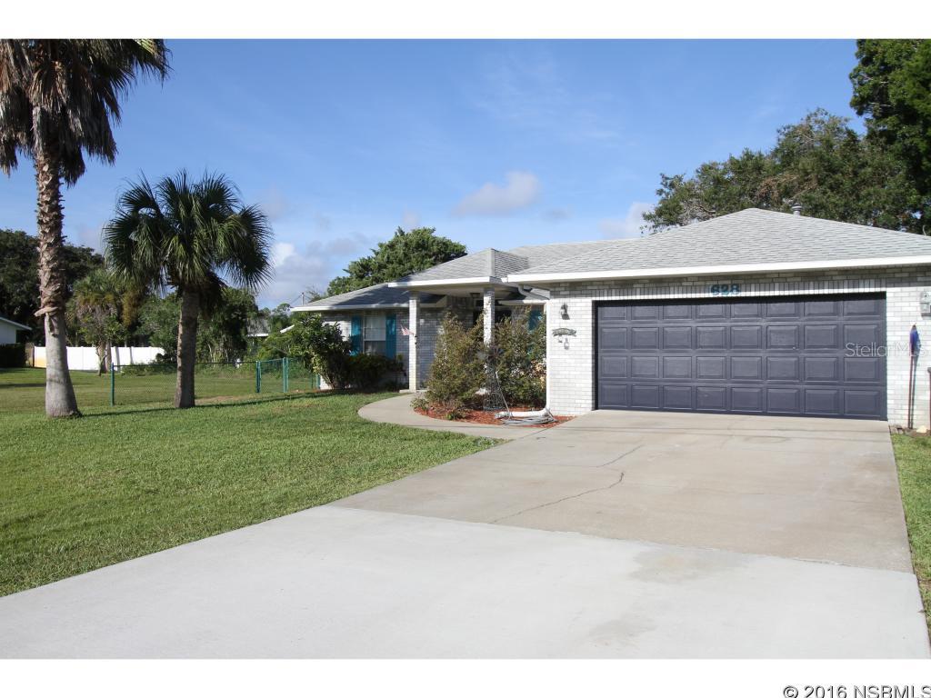 BEAUTIFUL LARGE CENTRAL BEACHSIDE HOME ON A QUIET STREET IN THE MOST SOUGHT AFTER PART OF TOWN. CLOSE TO THE BEACH AND FLAGLER AVENUE, THIS 3 BEDROOM 2 BATHROOM HOME KITCHEN RENOVATED IN 2005 W/ GRANITE COUNTERS AND WOOD CABINETS. , GREAT FLOOR PLAN, TWO CAR OVERSIZED GARAGE AND A PERFECT VACATION OR PERMANENT HOME.....2004 ROOF...2011 A/C COMPRESSOR. BRING THE FAMILY THE PETS AND LIVE THE NEW SMYRNA BEACHSIDE LIFESTYLE. ;Water: City