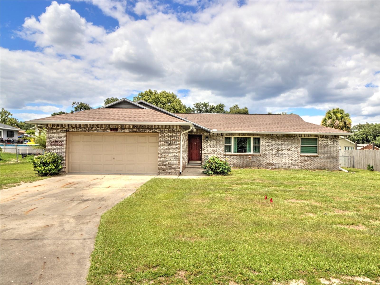 Wonderful 3/2 split plan home in the quite SE neighborhood of Wineberry. This home features all updated windows and doors and brand-new roof due to be replaced before any closing date! This home has a large eat-in kitchen with pantry and bay window overlooking the backyard and lets in all the natural light. There is a dining area right off the kitchen that looks out into the living room. The primary bedroom has an ample walk-in closet and separate sink and vanity area from the newly updated walk-in shower. The guest bathroom has also been updated with a new walk-in shower. Walking out the newer vinyl sliding glass door you step into the charming screened in porch that makes a perfect space to relax and entertain as you look out over the large fenced in back yard.