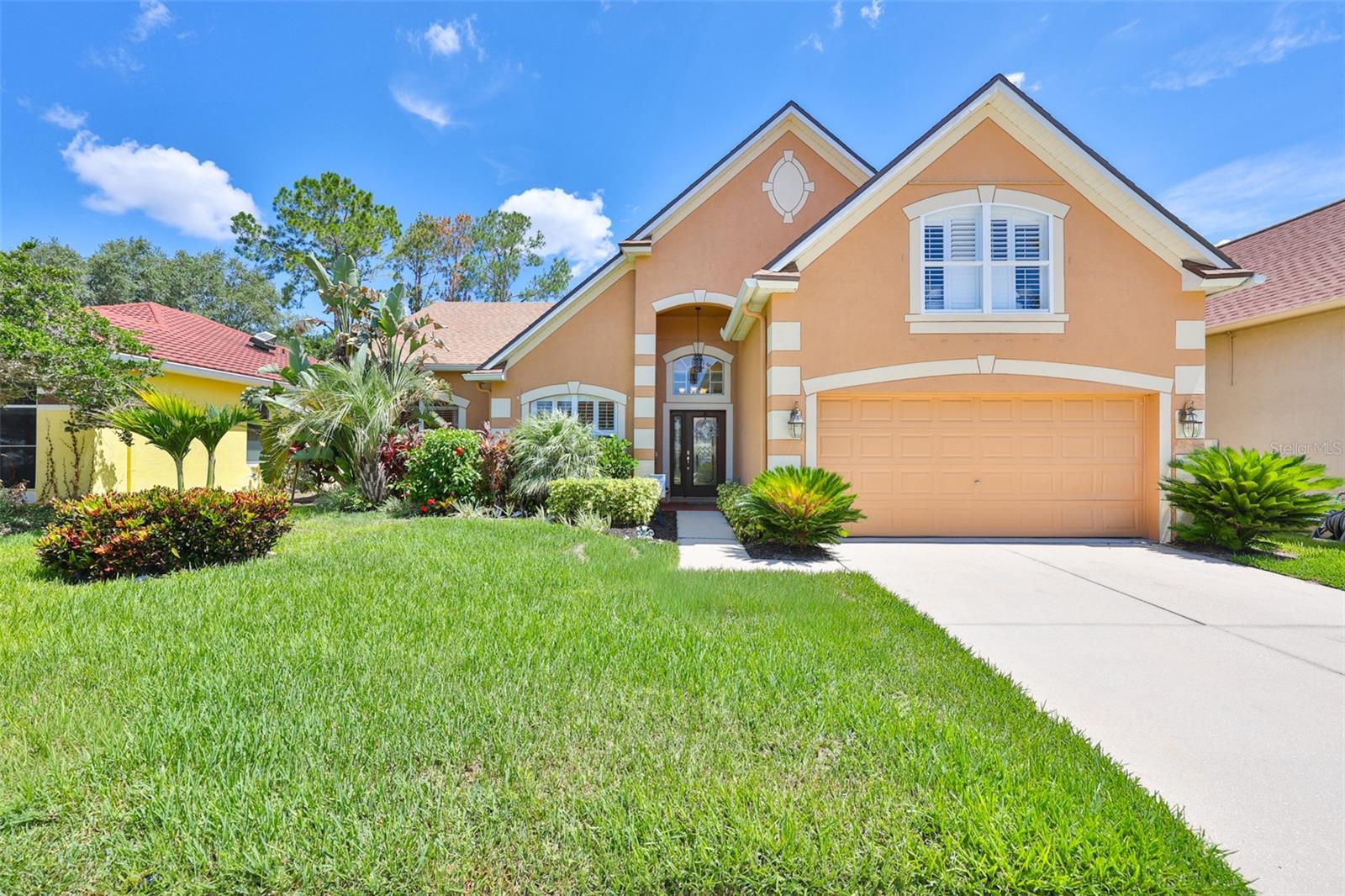 Don't miss out on this beautiful Apollo Beach SHOWCASE home with the ultimate coastal living experience. As you enter the Covington Park neighborhood and pass the landmark "clocktower" you will be amazed at the beauty of the well-developed trees  and landscape surrounding this area. The front door of this home leads the way to a wide-open floor plan and you are immediately drawn to the elegant  looking porcelain tile floors that extend throughout the entire open rooms and bathrooms.  All 4 bedrooms floors are covered with luxury  vinyl planks for easy maintenance. With more free time, you are drawn to the captivating outdoor pool paradise oasis, which includes a 13 X 30 saltwater inground pool, pool heater rated for 25K gallon pool  and travertine patio floor that extends into the screened in lanai. This backyard displays an island retreat feel with palm trees and tropical landscaping, cantilevered pool umbrellas and chaise lounges. The home has Kevlar hurricane rated roll up remote screen for the lanai and Storm Smart shutters for all the windows.  New roof  2020,New HVAC 2024, New gas heater 2025, exterior house painted less than 5 yrs. Enjoy natural gas for all your needs.  Equipped with a BRUNO (German engineered) stair chair lift for access to the 2nd floor suite & half bathroom. This home could be considered a generational property.  All bathrooms have been beautifully updated for enjoyment of the new homeowners.  There is a list of pool equipment  and furniture included in the sale of this property like a whole house 10K generator & large propane tank, to name a few to make this an easy  move. Come and enjoy everything this Florida coastal home has to offer you.