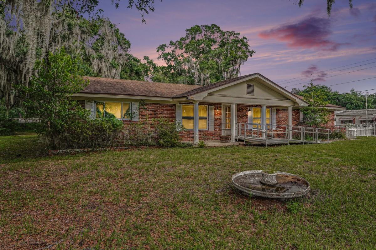 CALLING ALL INVESTORS or Do it yourself buyers! This Instant equity and incredible potential await the savvy buyer ready to make this North Lakeland gem their own!
Nestled on a sprawling 0.88-acre lot with no HOA, this 3-bedroom, 3-bathroom which includes 2 Bonus rooms brick home offers 1,756 square feet of solid living space and the kind of lot size that is nearly impossible to find at this price point. 
With brick construction, an attached 2-car garage, and a generous footprint, the bones are strong and the opportunity is real. The oversized lot offers endless possibilities — room for a pool, a workshop, an RV or boat, future expansion, or simply the wide open space and privacy that most neighborhoods can no longer offer. 
Surrounded by mature trees and set back from the road, this property has the feel of a private retreat while staying close to everything Lakeland has to offer. You are just minutes from US-98, local dining, shopping, medical facilities, and easy access to I-4 for commuters heading to Tampa or Orlando. 
Zoned R-3 with no deed restrictions, this is a rare chance to own nearly an acre in an established area of Polk County and truly customize it to your lifestyle and vision. Priced to reflect the opportunity — bring your ideas, bring your contractor, and come see what is possible. 
With Sales in the area ranging in the $450K PLUS, this property has tremendous upside! Sold AS-IS.