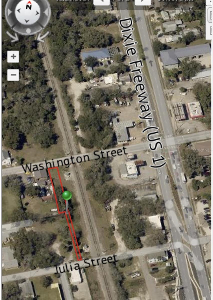 Long and narrow parcel of land ideal for warehouse units.  Located west of US HWY 1 and just west of railroad tracks between Washington St. and Julia St.