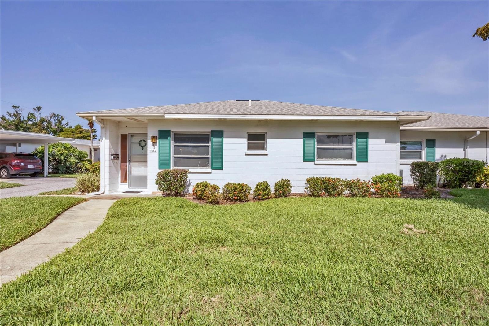**VENICE ISLAND*** This Sunny Updated End-Unit is in the Beach Manor Villas, an active 55+ Maintenance Free Community with a resort-style year-round heated swimming pool. The gourmet Kitchen has wood cabinets, granite countertops and newer appliances with a pass-through to the Sunroom. This amazing home includes (2) spacious Bedrooms,1.5 Bathrooms, Laundry Room with washer/dryer hook-ups, plus a Private Covered Carport and a large brick paver Patio. Quiet location and there are no shared walls with other units. Every day is a holiday at this friendly island community. Make new friends while lounging at the pool or relax watching the breathtaking sunsets from your patio. It’s only a short walk to the public beach where you can enjoy a delicious meal at the famous Sharky’s Restaurant overlooking the Venice Fishing Pier. Close to Historic Downtown Venice shopping with amazing boutiques and restaurants, Venice Theater, Venice Airport, the Fairgrounds and the Venice Lake 18-hole golf course. Outdoor enthusiasts can experience boating and shelling excursions or a vigorous walk or bike ride along the Legacy Trail. It is always exciting to explore the extraordinary Venice Island. HOA fees include professional management, property insurance, water, sewer, trash, cable TV, lawn service, pest control, exterior maintenance and a heated swimming pool with clubhouse.