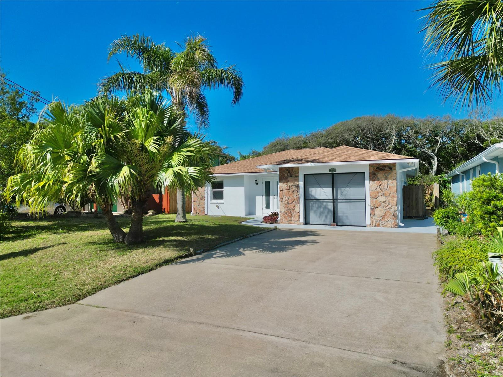 Enjoy coastal living just steps from the beach in this charming 2-bedroom, 2-bath home situated on a spacious lot with convenient rear alley access. Tucked away with a wooded backdrop, the property offers exceptional privacy and a peaceful setting.
Inside, you’ll find an open floor plan filled with natural light, providing the perfect canvas to update and make it your own. Whether you're looking for a primary residence, vacation getaway, or investment opportunity, this home is full of potential.
Located in highly desirable Flagler Beach, you’ll love the laid-back lifestyle with quaint restaurants, local shops, and a popular weekly farmers market all just a short golf cart ride or bike ride away.
Don’t miss this opportunity to own your slice of beachside paradise! Seller is offering 5k at closing towards closing costs.