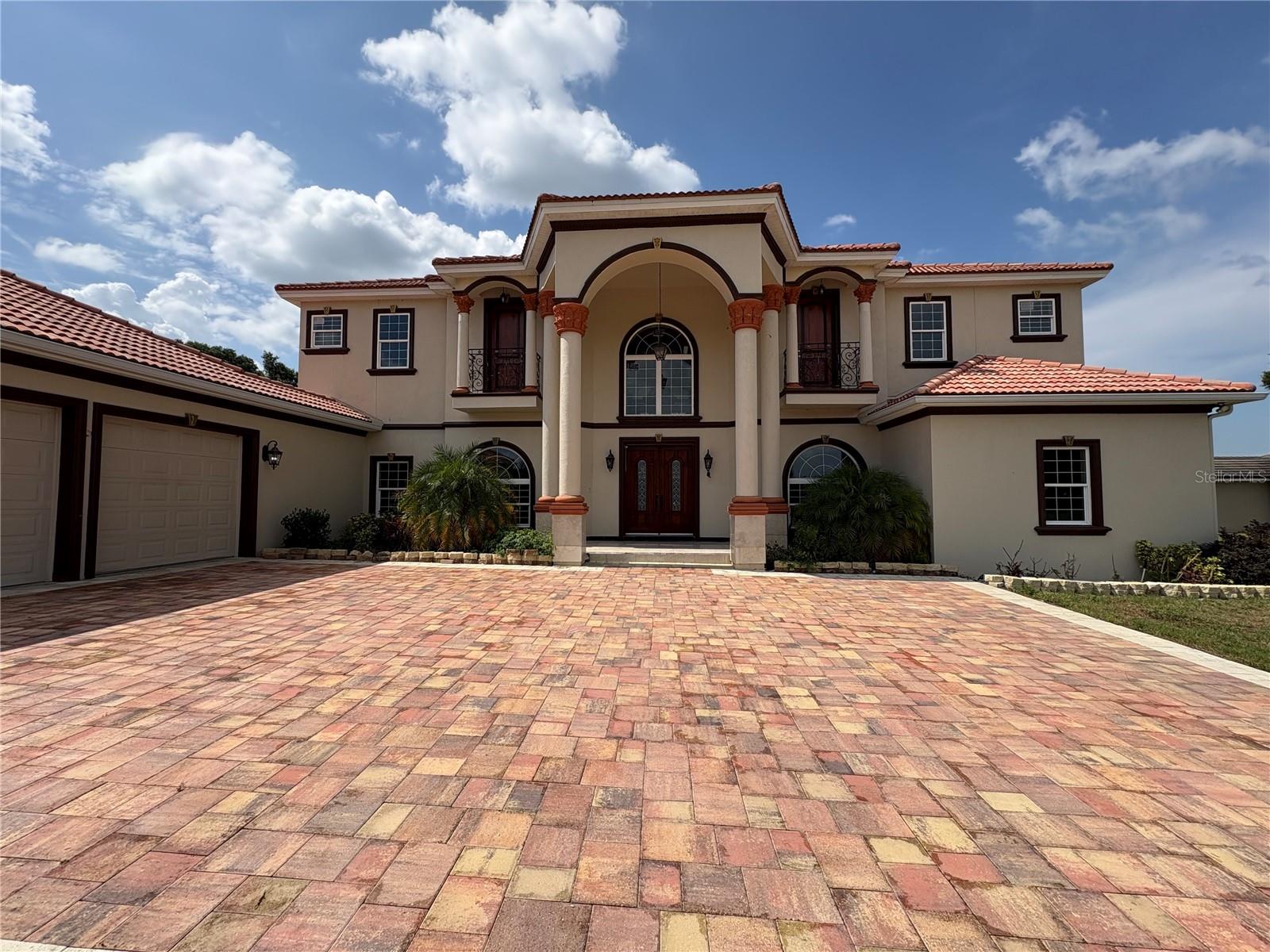 Virtually Staged. Brand-New 2025 Luxury Estate | 7,500+ Sq Ft | 1 Acre | Private Lake Access | Resort-Style Pool | Thonotosassa, FL
Welcome to 10908 Flint Estates Drive, a newly built 2025 custom luxury residence offering 7,500+ sq ft, 6 bedrooms, 6 bathrooms, and 1 acre of private, gated living in the exclusive Thonotosassa community. Designed for both grand entertaining and refined daily living, this estate blends timeless elegance with modern sophistication. Builder structural warranty and whole home warranty for 12+ months. 
*Property Highlights
6 Bedrooms | 6 Baths | 3-Car Garage
Brand new construction (2025)
Over 7,500 ft² of living space
1-acre homesite
Deeded Lake Thonotosassa access — bring your boat
Resort-style heated pool, fire features & covered lanai
Double grand staircase + multiple crystal chandeliers
Marble & luxury wood flooring throughout
3 AC + 2 water heaters
No CDD | Low HOA
*Interior Features
Impressive double-staircase foyer with soaring ceilings & chandeliers
Office with custom cabinetry
Formal living & formal dining rooms
Chef’s kitchen:
Double islands (prep + breakfast bar)
Custom cabinetry & luxury appliances
Breakfast nook
Family room with coffered ceilings + grand chandelier
First-floor flex gym/bonus room with pool access
Marble flooring on main level
Upstairs loft + theater/media room
Laundry room with cabinetry & utility sink
* Bedrooms & Baths
Primary suite with:
Private balcony
Dual custom walk-in closets
Spa bath with jacuzzi tub & oversized walk-through rain shower
5 additional bedrooms, each with a private bath
Custom closet systems in all rooms
Luxury wood flooring upstairs
* Outdoor & Lifestyle
Expansive covered patio
Heated pool + fire features
Marble balcony spanning the length of the home
Iron railings + lake views
Propane system for gas heater & fire features
Access to Lake Thonotosassa — boating, fishing, watersports, seaplanes, and wildlife watching
* Location
Located just outside Tampa, minutes from:
I-75 & major commuter routes
Brandon, Wesley Chapel, and downtown Tampa
Local parks, trails, equestrian estates & nature preserves
* Lifestyle Description
Experience private luxury living just minutes from Tampa — where waterfront recreation, refined design, and grand entertaining come together. This is a rare opportunity to own a showpiece estate with lake access in one of Hillsborough County’s most exclusive enclaves.
*
This extraordinary home is built for those who expect the very best.
Schedule your private tour today.