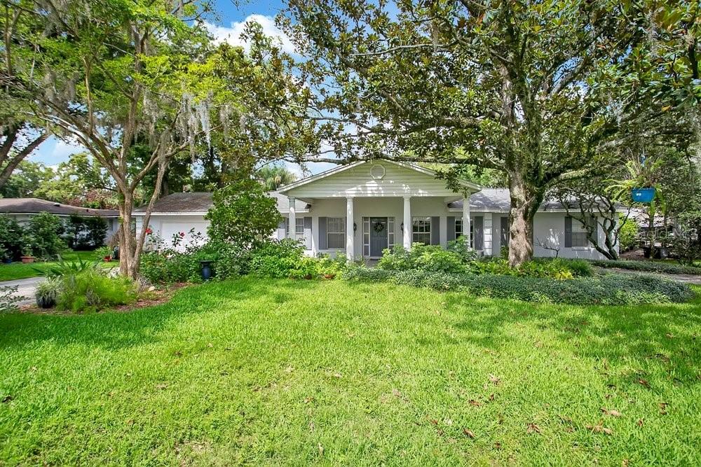 Offered for the first time, this original 1973 ranch is a rare find in the heart of Windermere. Nestled on an oversized .42-acre lot along a picturesque sand street, this 5-bedroom, 2.5-bath home presents an exceptional opportunity to create your dream property in one of the town's most sought-after locations.

Designed with Florida living in mind, the spacious floor plan opens to an oversized screened pool and expansive outdoor living area, perfect for entertaining family and friends. A circular driveway and porte cochere provide convenience and timeless curb appeal, while solid block construction and a newer roof create lasting value.

Location is everything. Stroll to charming shops, restaurants, the local brewery, farmers markets, and year-round community events. Enjoy the freedom of a golf-cart-friendly neighborhood with no HOA, plus access to the renowned Butler Chain of Lakes.

Whether you're looking to renovate, expand, or build new, this exceptional property offers the perfect canvas. Bring your builder, bring your imagination, and seize this rare opportunity to create something truly special in the heart of Windermere.