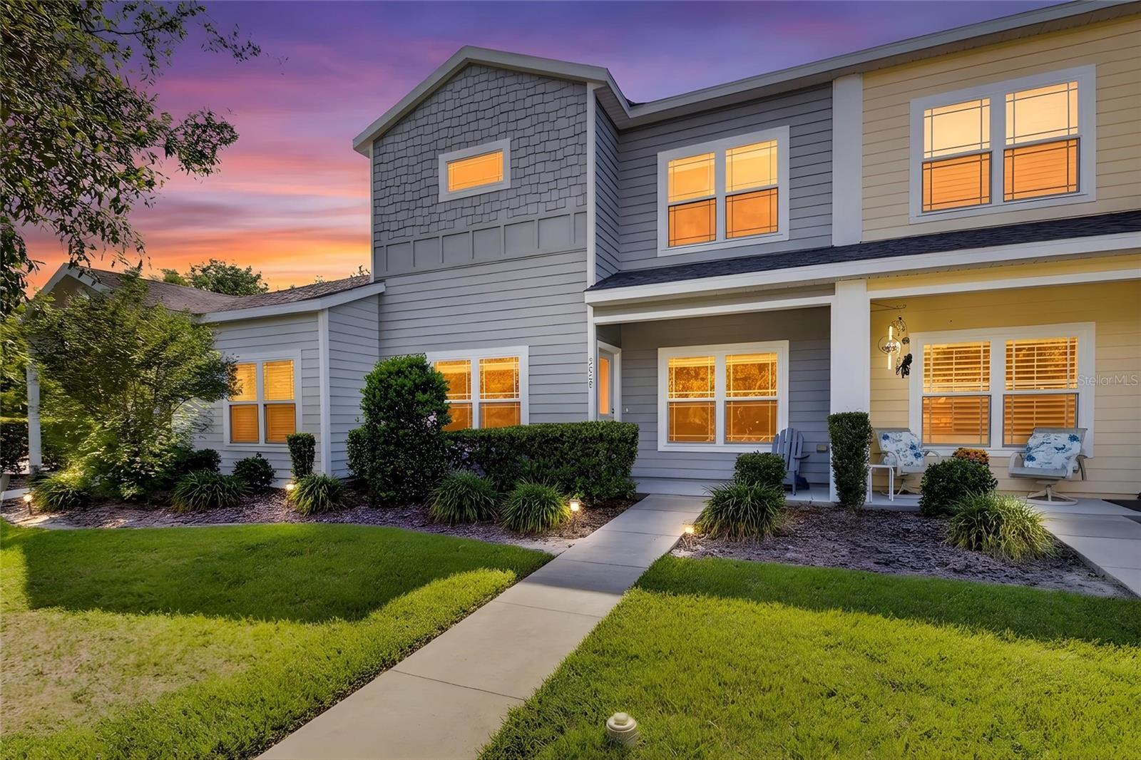 Nestled within the resort-style community of Sorrento, this stunning two-story townhome offers 3 bedrooms, 2.5 bathrooms, and a versatile bonus room, perfectly suited for a home office, private gym, or a true 4th bedroom. Complete with a welcoming front porch and a spacious two-car garage, this home blends modern design with functional elegance. Inside, you will find premium finishes throughout, including sleek quartz countertops in the kitchen, elegant wood cabinetry, and stainless steel appliances. Modern conveniences abound with a tankless water heater, alongside durable tile flooring in all bathrooms and the laundry room.
Designed for effortless living, the comprehensive HOA covers roof care, landscaping and lawn maintenance, exterior pest control, termite coverage, annual pressure washing of the building, and hazard insurance, allowing you to leave the chores behind and enjoy your mornings on the welcoming front porch. Residents gain access to resort-style amenities, including a beautiful clubhouse, a sparkling community pool, a fully equipped fitness center, a playground, tennis and pickleball courts, a basketball court, walking and bike trails, and indoor recreation like pool and ping pong tables. Ideally situated just 10 minutes from the University of Florida, UF Health Shands Hospital, and the Malcom Randall VA Medical Center, this prime location also places an abundance of nearby shopping and dining options just moments away, offering the perfect blend of comfort, convenience, and connected living.
