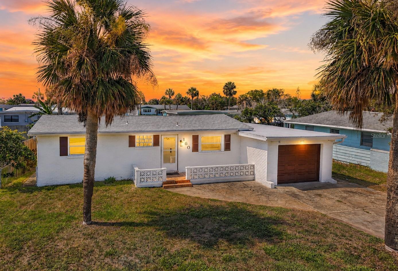 Beachside living meets move-in ready comfort! Just minutes from the sand, this beautifully remodeled 3 bedroom, 2 bath home offers the perfect opportunity for a primary residence, vacation getaway, or income-producing rental. This home is ready for you to start enjoying the Florida lifestyle from day one.

Step inside to find a bright, open layout featuring NEW tile flooring throughout, a completely remodeled kitchen with stainless steel appliances, and a center island perfect for gathering with family and friends. The living and dining areas flow seamlessly together, creating a comfortable space for everyday living and entertaining.

The primary suite features a beautifully updated private bath, while the secondary bedrooms are well-sized and share a renovated guest bathroom. Additional updates include a NEW washer and dryer, remodeled bathrooms, updated finishes, and a roof that is approximately 4 years old.

One of the standout features of this home is the large sunroom overlooking the backyard. Filled with natural light, this flexible space can serve as a second living area, game room, reading retreat, or additional entertaining space. Outside, you'll find a covered patio and plenty of room to enjoy the sunshine and coastal breezes.

The one-car garage provides additional storage for beach gear, bikes, golf clubs, and more.

Located in the heart of Ormond Beach's desirable beachside community, you'll love being just moments from the Atlantic Ocean, nearby riverfront parks, restaurants, shopping, and all the attractions that make coastal living so special. Whether you're looking for a personal beach retreat, seasonal escape, or investment opportunity, this fully furnished home checks all the boxes.