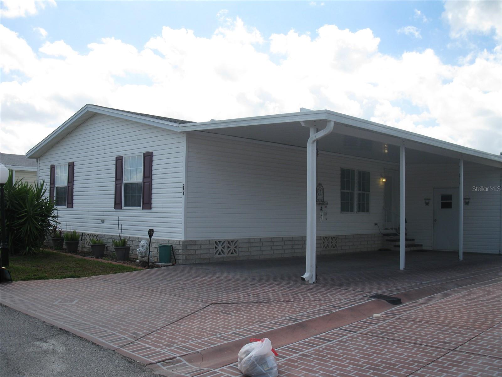 Hard to find 3 bedroom Home.  2001 Jacabson home is beautifully laid out with plenty of light and room to move.  Large Kitchen with laundry center.  Split floor plan with good size rooms.  Primary bedroom has his and hers closet with a large bathroom suite.  The finished Florida room off the kitchen has multiple uses, sitting room, another TV room, extra bedroom, sewing or craft room.  Roof new in 2023.  A/C is brand new, with new Duct work and Thermostat.  This home is a premium home, Turn Key, made by Jacabson.  See this home before you make a decision because you will love living in Sweetwater Community, where you have a deeded lot, amenities like a heated pool, fitness center, 18 hole golf course, lake frontage and marina, tennis court, pickle ball court, shuffleboard courts, a large beautiful clubhouse with billiards, library, craft room, ballroom and a full service English Pub.  We are a very active community where there is always something going on.   Visit Sweetwater and let us give you a tour.