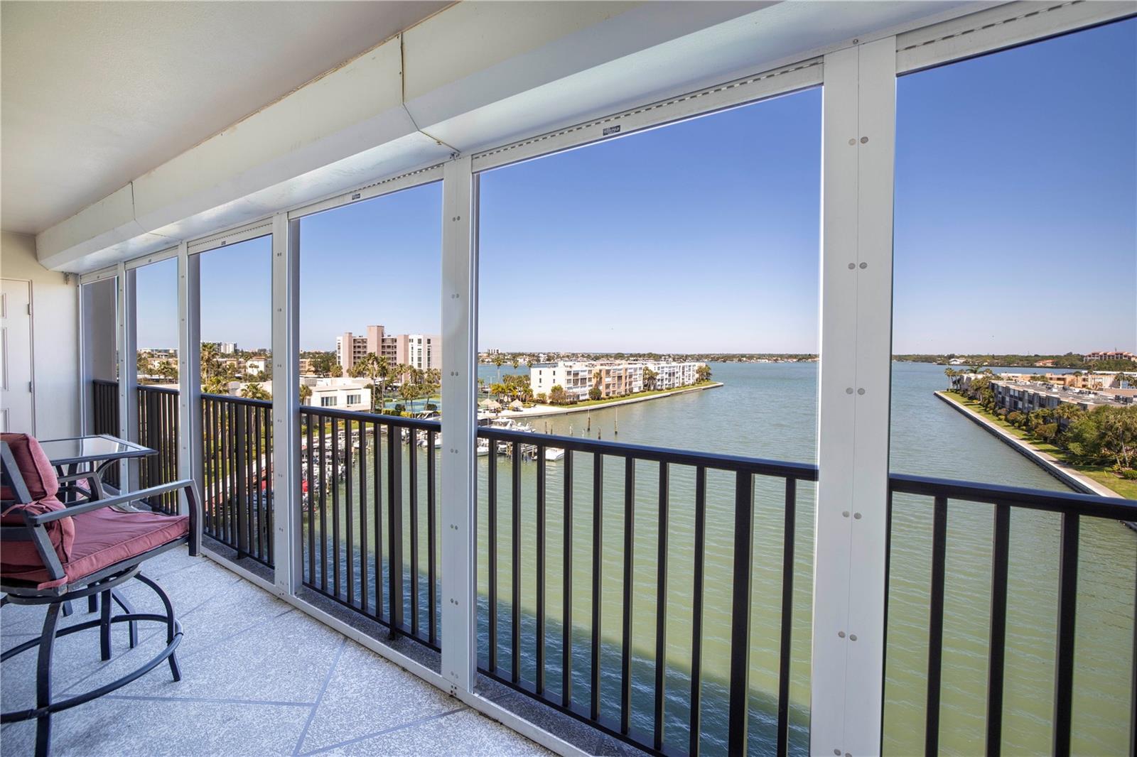 Calling all Savvy Buyers!!!  Positioned on the 6th floor with arguably one of the most breathtaking panoramic water views in the community, this extensively remodeled residence offers an extraordinary combination of luxury, lifestyle, and value. At this price point, buyers would be hard-pressed to find another condo offering this level of renovation, elevation, and view.

Completely transformed in 2019, the seller spared no expense in creating a sophisticated coastal retreat designed to showcase the spectacular waterfront scenery from nearly every angle. The renovation included retextured ceilings, updated can lighting, new textured sheetrock walls, upgraded interior doors, a fire-rated steel front door, and beautiful neutral tile flooring throughout, creating a clean and timeless coastal aesthetic.

The kitchen is truly the centerpiece of the home — thoughtfully designed to blend elegance and functionality while keeping the stunning water views front and center. Features include quartz countertops, custom cabinetry, designer backsplash, stainless steel Samsung appliances, a large stainless sink, Hansgrohe faucet, and an expansive breakfast bar ideal for entertaining or simply enjoying the peaceful waterfront backdrop. Every detail was selected with intention, creating a space that feels both upscale and inviting.

The spacious primary suite serves as a private waterfront sanctuary with incredible water views, a sitting area, oversized walk-in closet, and beautifully renovated ensuite bathroom. During the remodel, a second bedroom was also thoughtfully created, providing additional flexibility for guests or a home office.

Bay Island is one of St. Petersburg’s premier 55+ waterfront communities, offering resort-style amenities including 6 heated pools, 2 spas, tennis courts, shuffleboard, a marina, fishing dock, waterfront walking paths, fitness center, billiards, clubhouse activities, and an active social lifestyle.

Located just minutes from the sugar sands of St. Pete Beach, waterfront dining, shopping, and vibrant downtown St. Petersburg, this is truly one of the standout values currently available in the Tampa Bay waterfront condo market.

Luxury waterfront living. Exceptional views. Remarkable value.  Do not miss out on this opportunity.