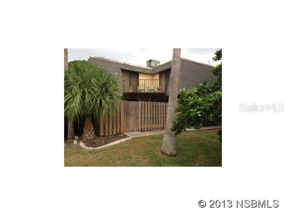 Terrific unit in charming Cedar Dunes Community. This home features tile floors, walk in closets, fenced courtyard with screened room and upper balcony to relax and enjoy your morning coffee. Makes a great winter home, new family first time home, or a prefect retirement/winter home in the much sought after New Smyrna Beach community. Walk to the beach, enjoy sunsets on the bay from the nature trail adjacent to the community. All Measurements are approximate. ;Water: City