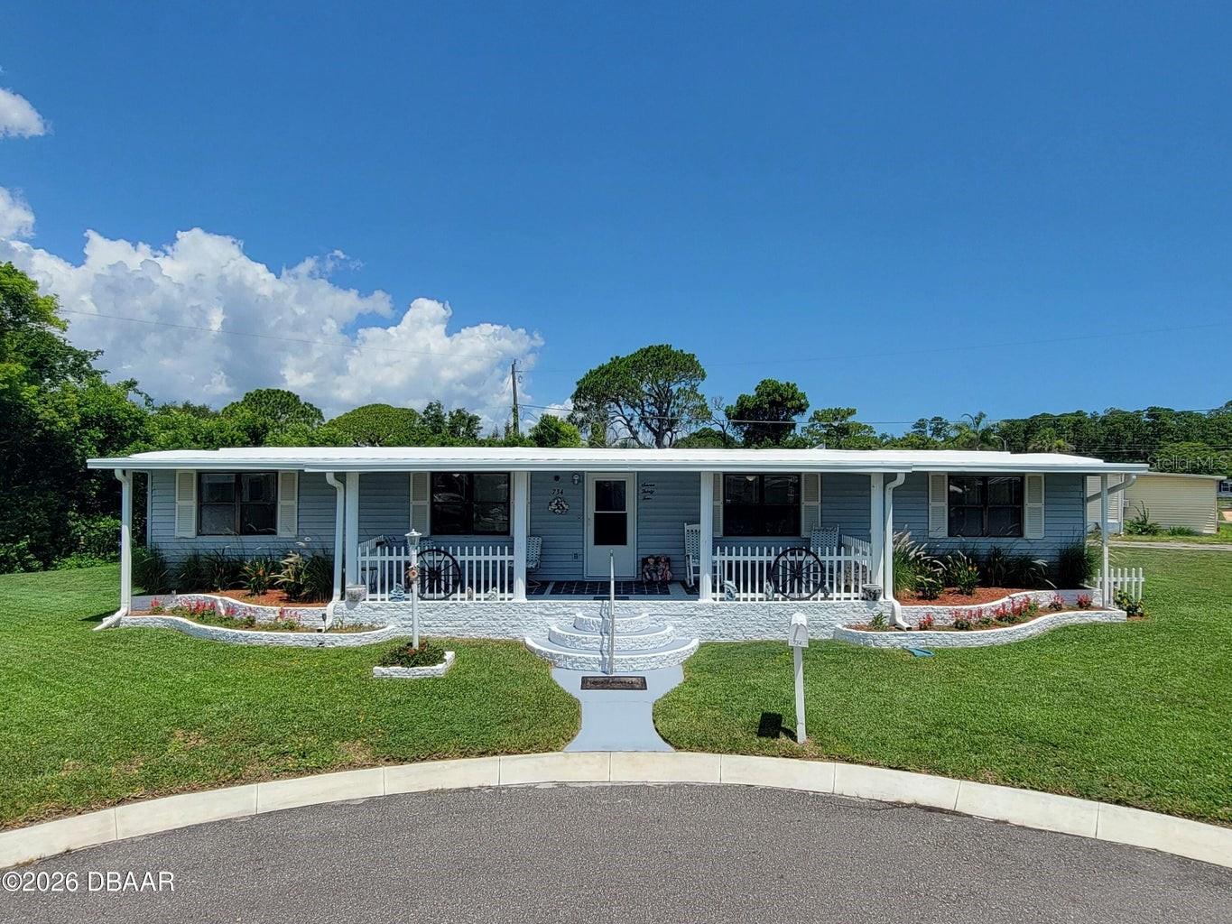 Welcome to 734 Sheldon Circle in beautiful Port Orange, Florida--a meticulously maintained 3-bedroom, 2-bathroom home offering space, versatility, and the laid-back coastal lifestyle that makes this area so desirable. Situated on an oversized lot, this property provides room to spread out, entertain, and enjoy the Florida sunshine. Inside, you'll find brand-new flooring throughout, a spacious and inviting layout, and a unique wet bar that creates the perfect setting for hosting family and friends. Pride of ownership is evident throughout the home, making it truly move-in ready. Step outside and discover what sets this property apart. Expansive front and rear porches provide the ideal spaces for morning coffee, evening relaxation, or gathering with guests year-round. The oversized lot provides abundant parking, including room for recreational vehicles, boats, trailers, and multiple vehicles. An RV hookup adds even more flexibility for travelers and outdoor enthusiasts.

For hobbyists, entrepreneurs, or those in need of additional workspace, the double workshop/shed with electricity offers endless possibilities--from woodworking and crafts to storage, home projects, or a private workspace.

Located just minutes from the Atlantic coastline, residents enjoy convenient access to beaches, boating, fishing, waterfront dining, shopping, healthcare facilities, and the many amenities that make Port Orange one of Central Florida's most sought-after communities. Whether you're a local buyer looking for extra space or relocating to Florida in search of a relaxed coastal lifestyle, this property delivers exceptional value, functionality, and charm.

Don't miss this opportunity to own a well-cared-for home with room for all your toys, hobbies, and Florida lifestyle dreams.