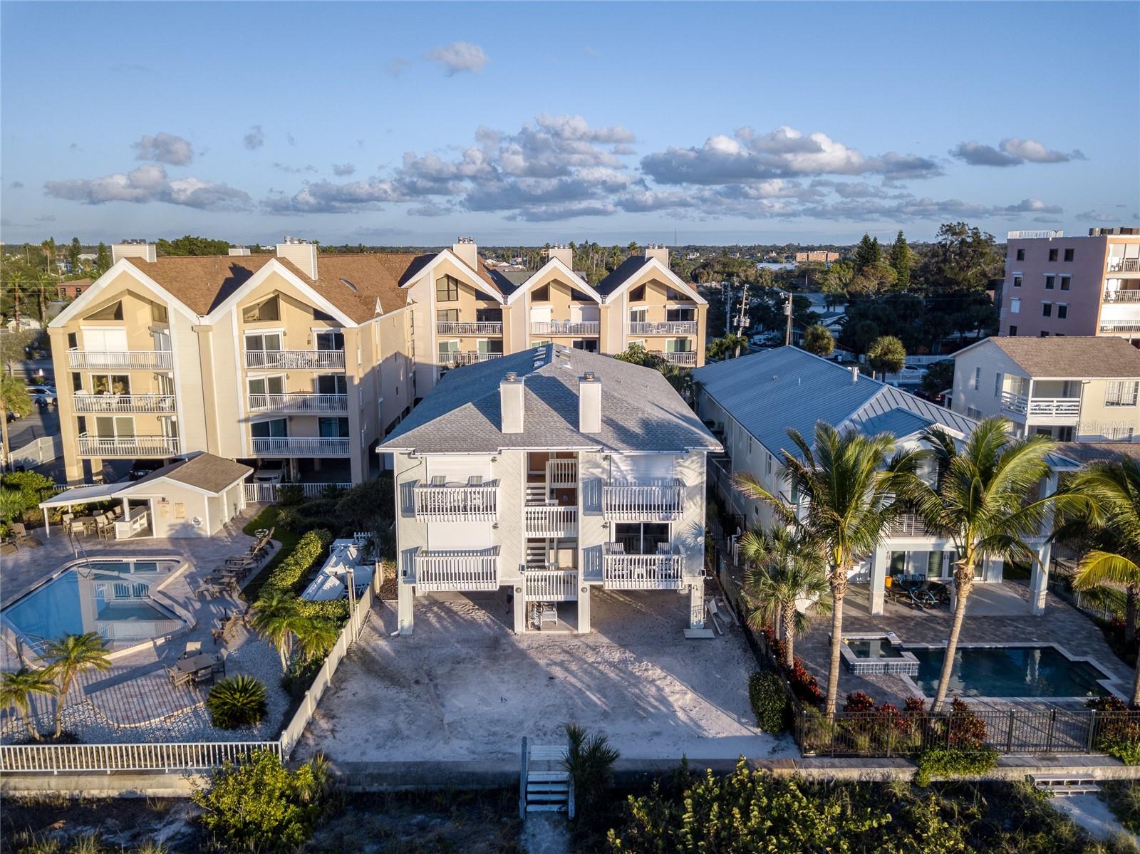 Stunning DIRECT GULF FRONT views from this fully remodeled 2-bed, 2-bath condo in Indian Rocks Beach. Located in a secluded 4-unit Beach House Condo, this front-row unit feels private and peaceful — practically on top of the sand with unobstructed sunsets from your balcony.
Inside, bright laminated floors and coastal-chic fixtures set the tone. The fully renovated kitchen boasts quartz countertops, modern cabinetry and newer appliances. An oversized laundry closet with updated washer/dryer adds convenience. Both bathrooms were tastefully redesigned with glass showers and designer vanities; the master suite offers Gulf views and a wall-to-wall closet. Thoughtful storage includes a dedicated unit for beach chairs and gear.

Systems updates include newer doors and windows, water heater and a 2022 HVAC. Parking is under the building (2–3 cars deep) with additional locked storage below. Walk to local restaurants, beach bars, cafes, grocery stores, fitness studios and waterfront parks — enjoy private beachfront living with easy access to dining and amenities. Schedule a private showing today.